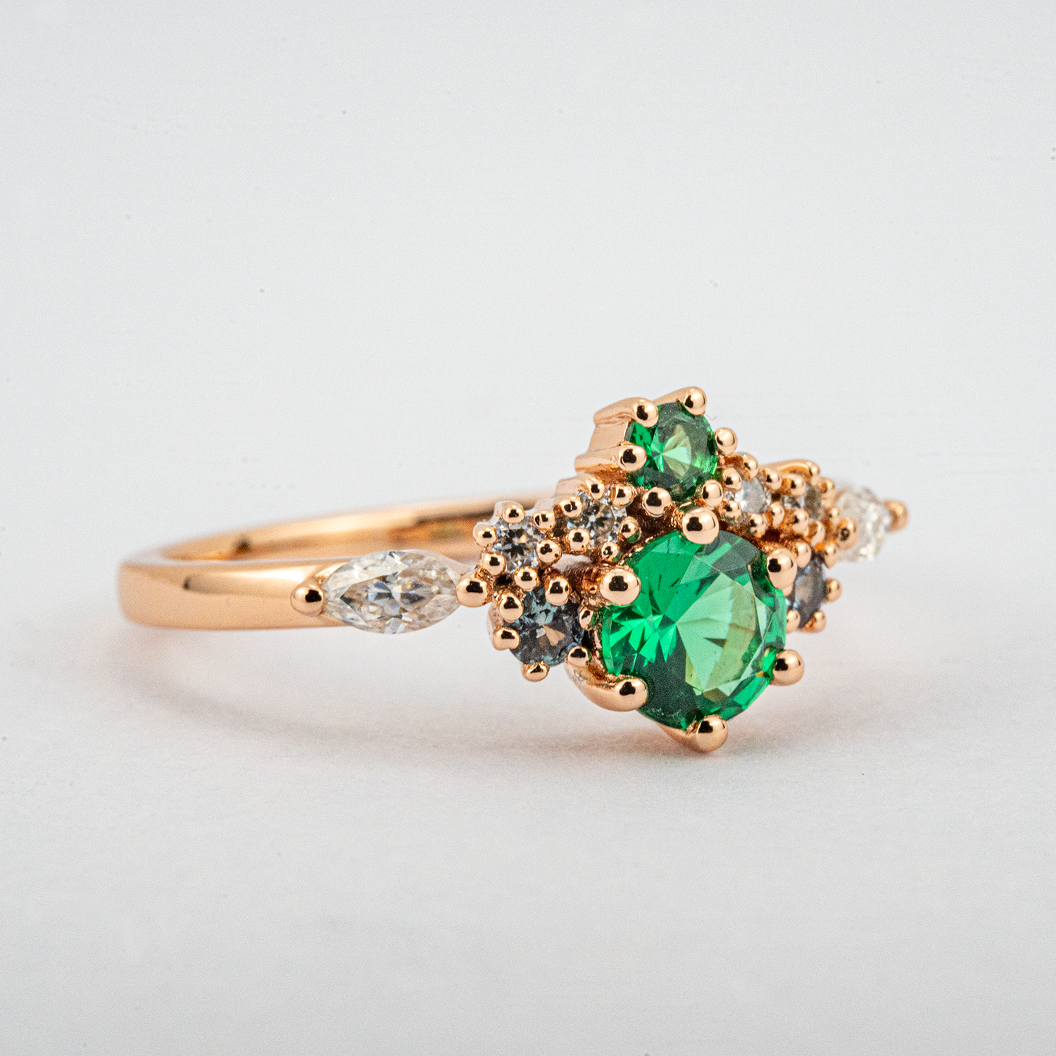 Stunning round emerald ring, perfect choice for engagements, timeless vintage design.