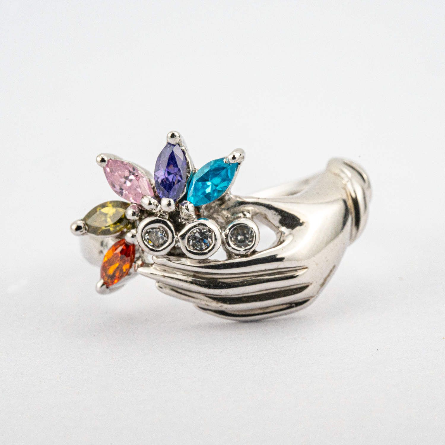 Unique white gold band featuring colorful gems for a striking accessory