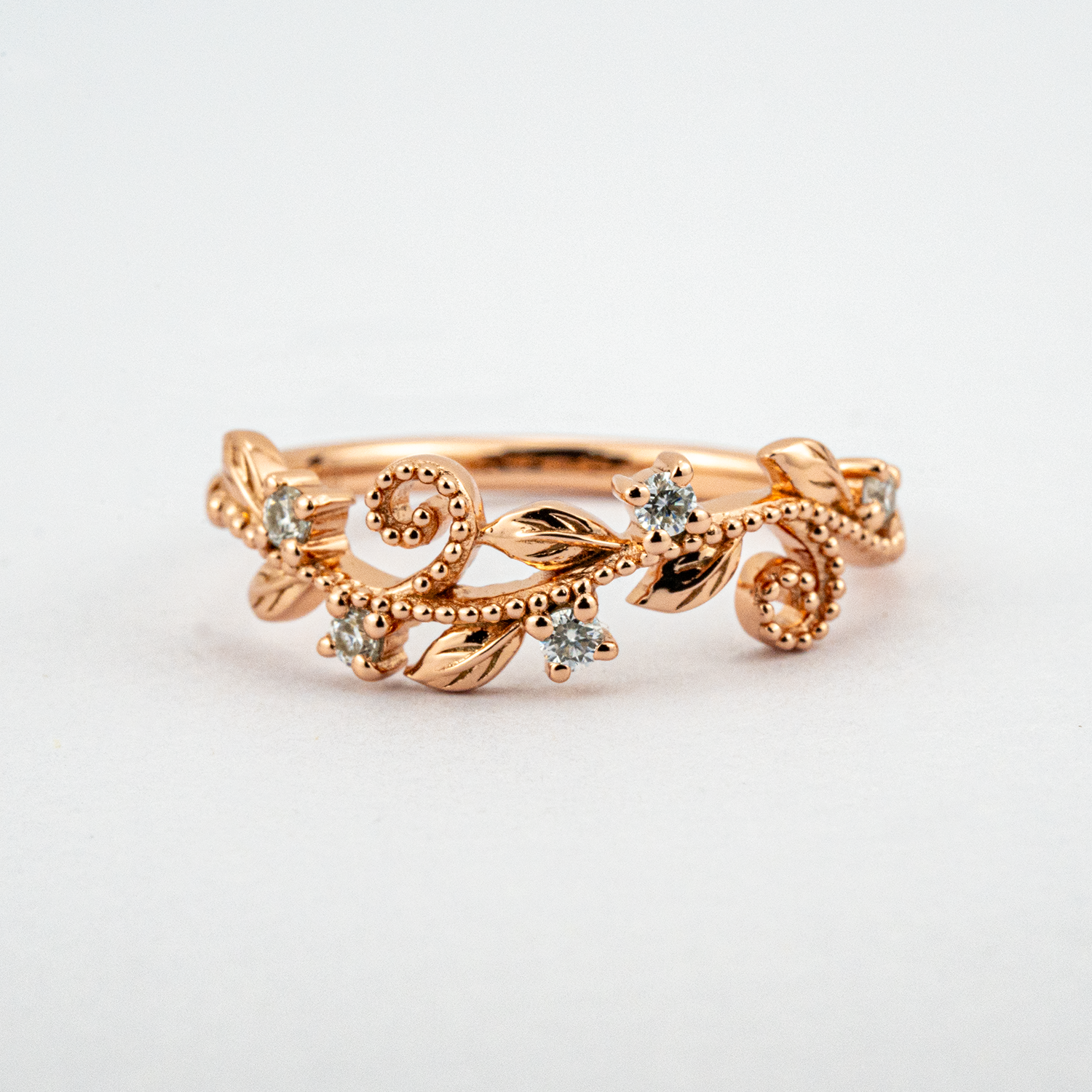 Elegant rose gold Art Deco ring, handcrafted with intricate details and a touch of luxury