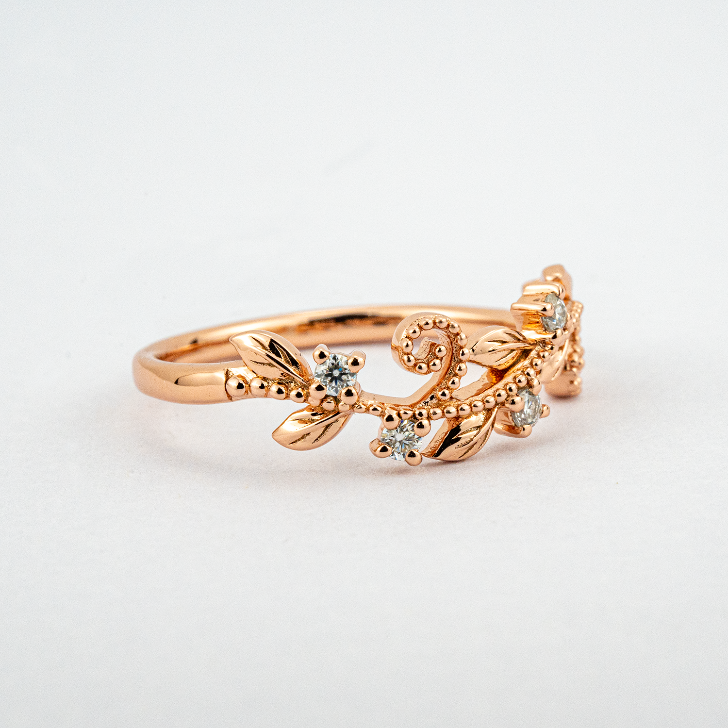Elegant rose gold Art Deco ring, handcrafted with intricate details and a touch of luxury