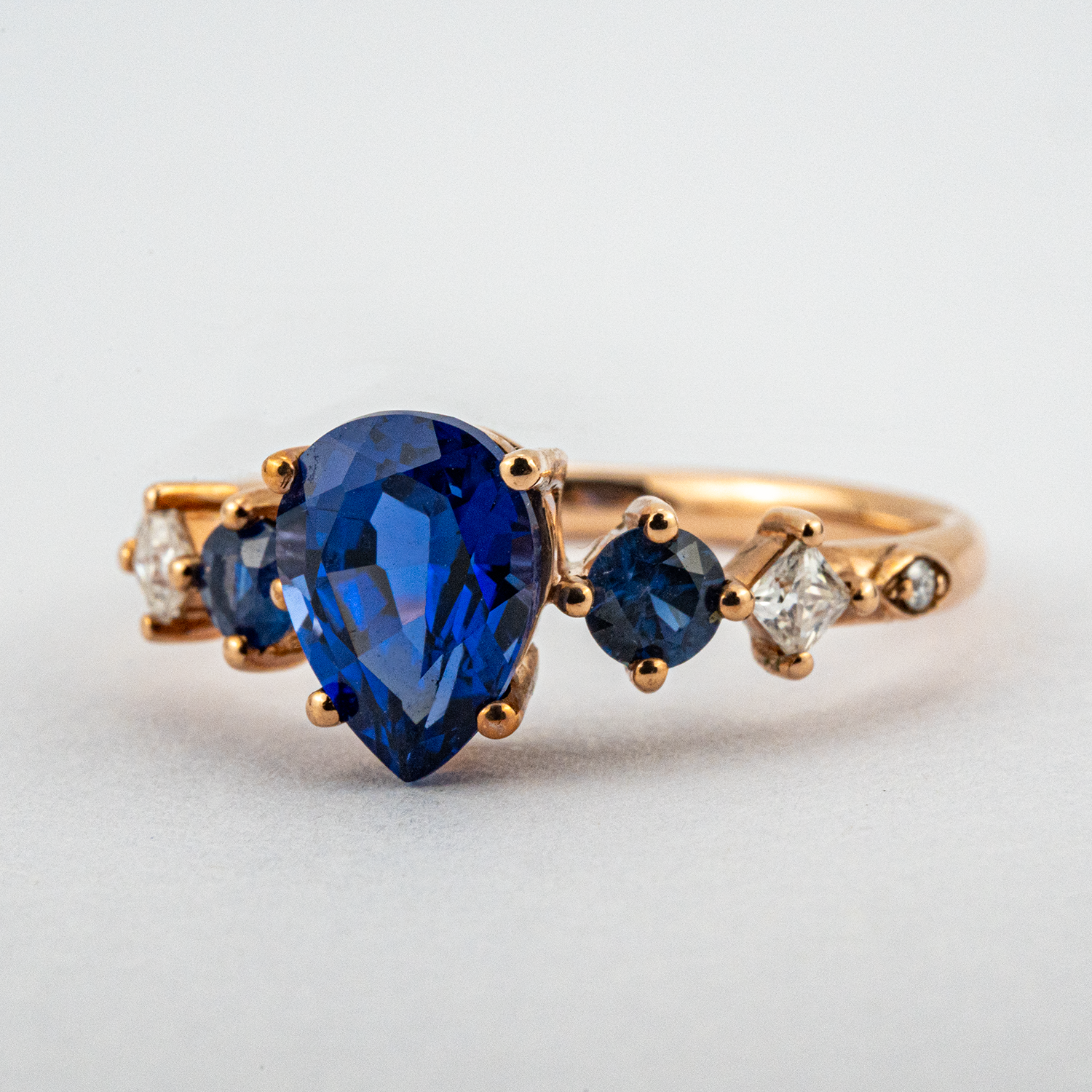 Gorgeous Sapphire engagement ring with stunning pear centerpiece