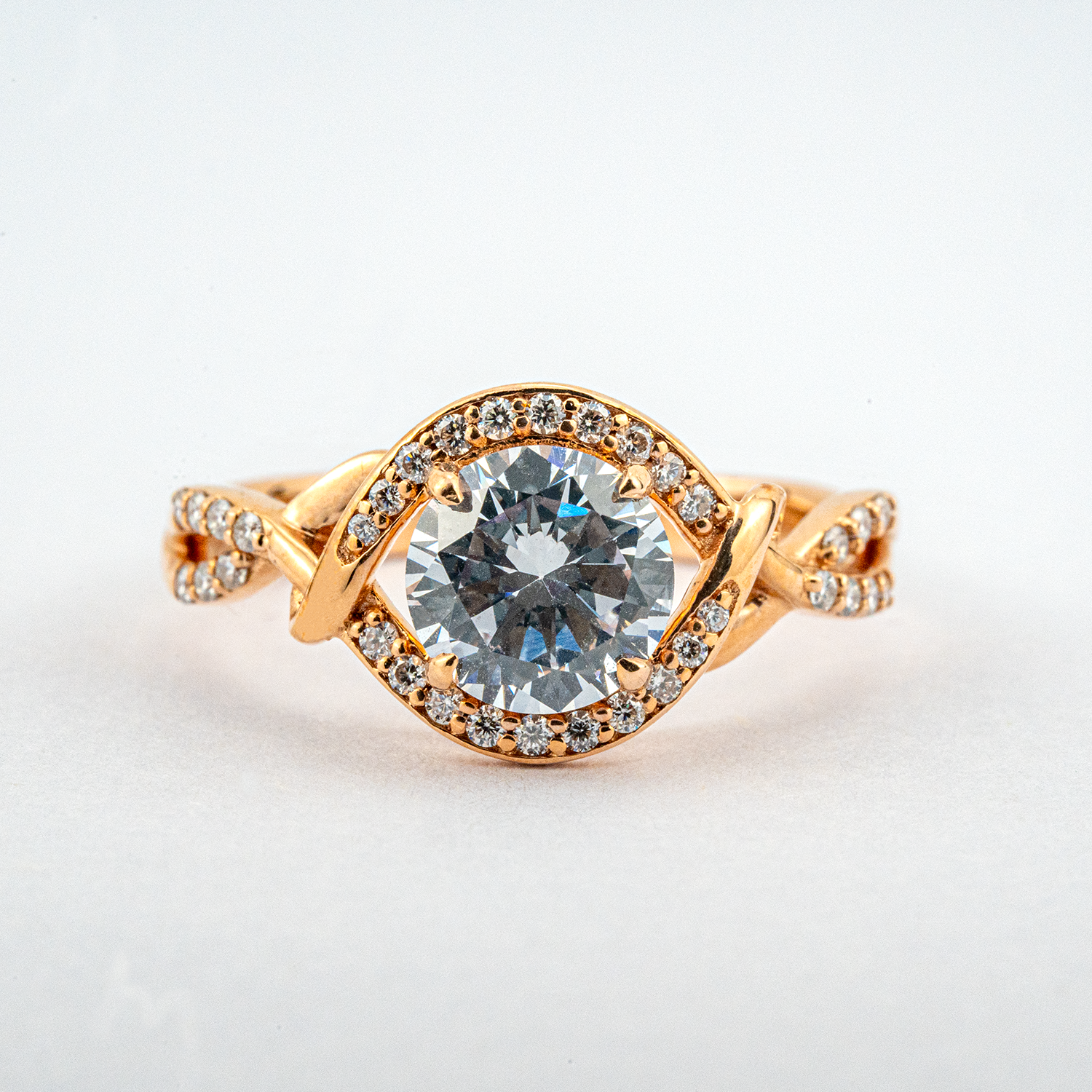 Moissanite round ring in rose gold setting for elegant style