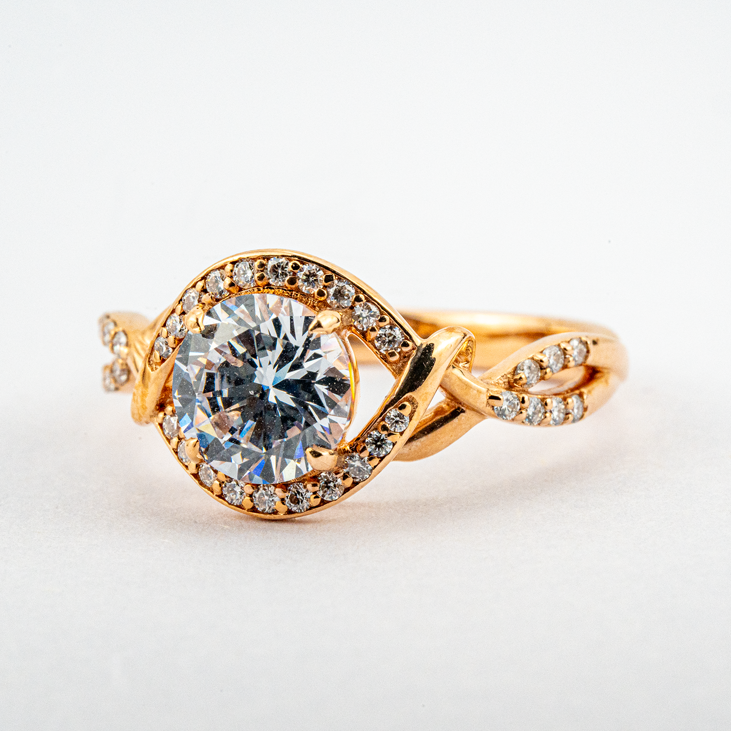 Moissanite round ring in rose gold setting for elegant style