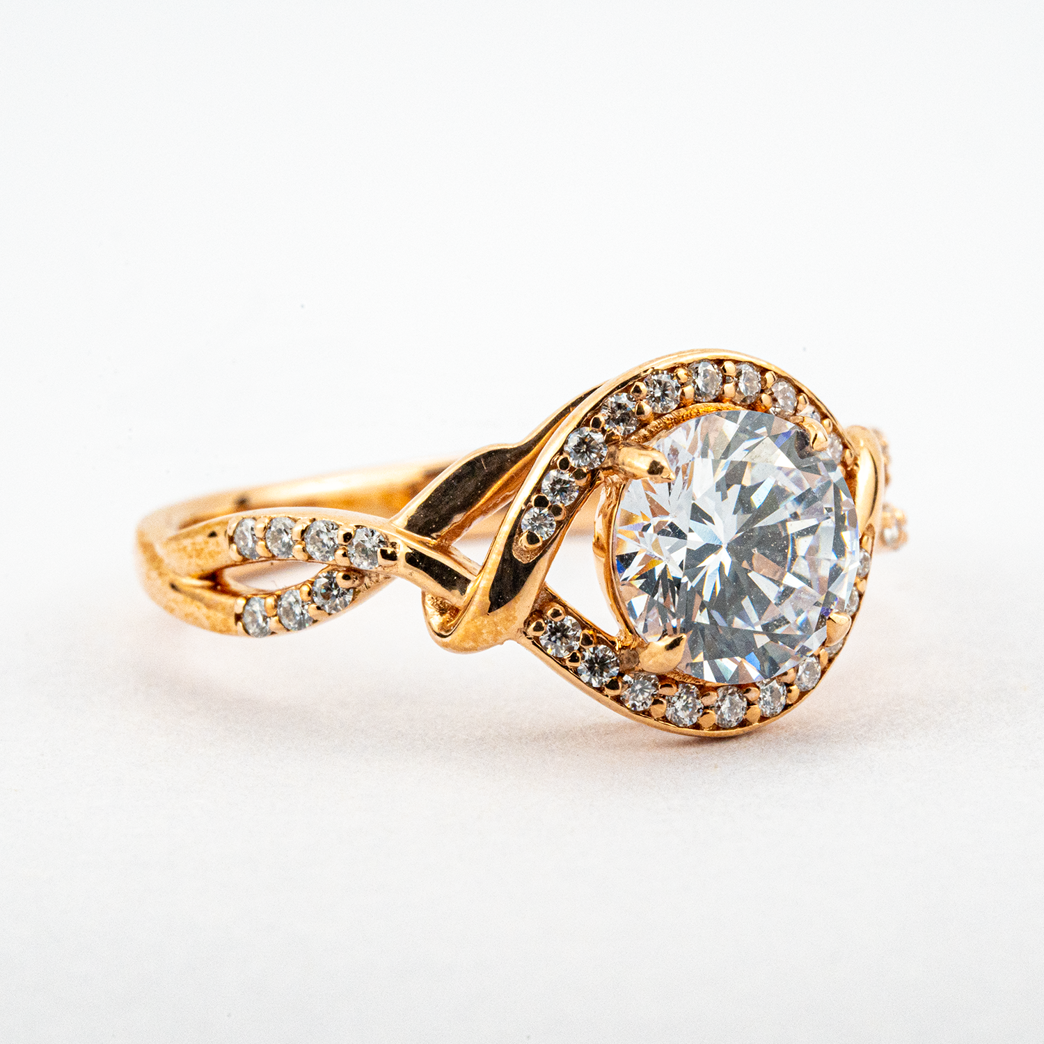 Moissanite round ring in rose gold setting for elegant style