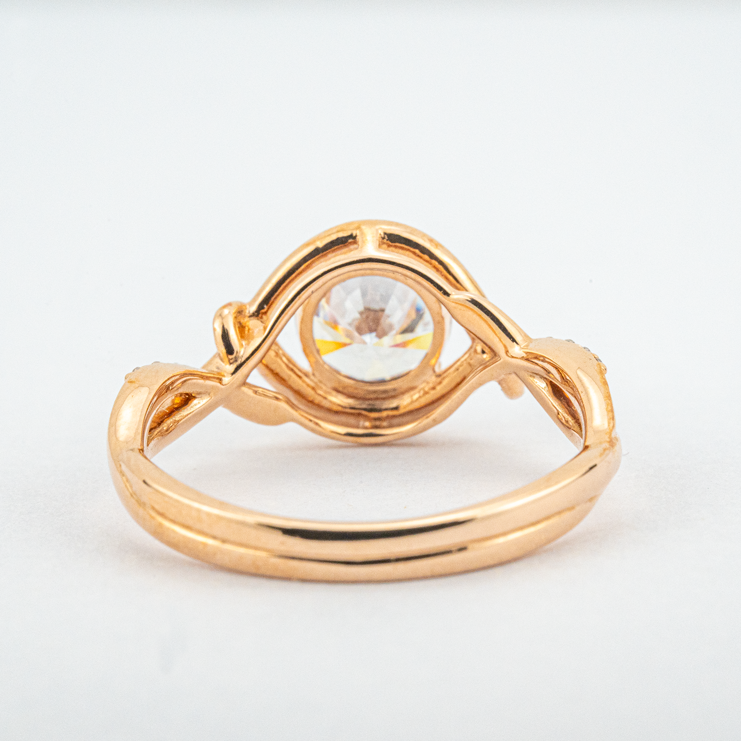 Moissanite round ring in rose gold setting for elegant style