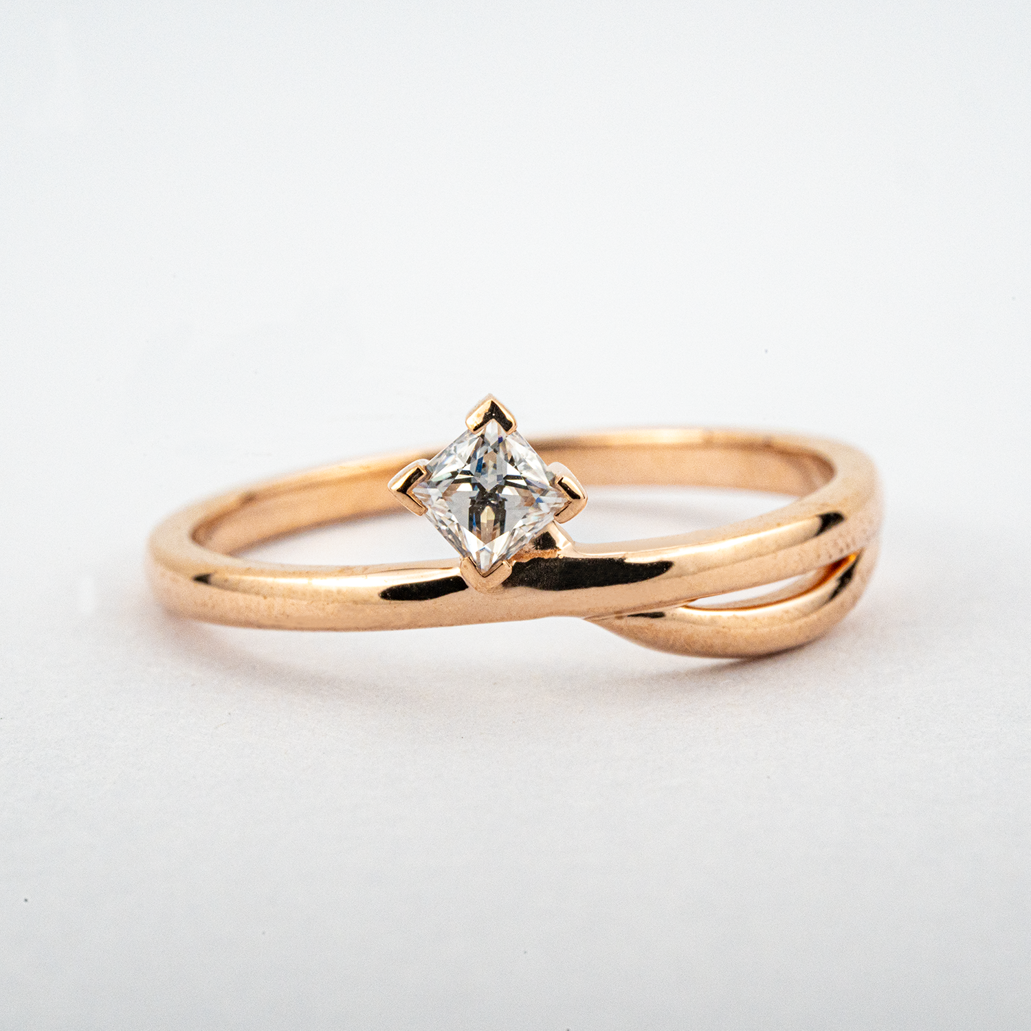 Beautiful minimalist engagement ring with diamond accent - perfect for a promise