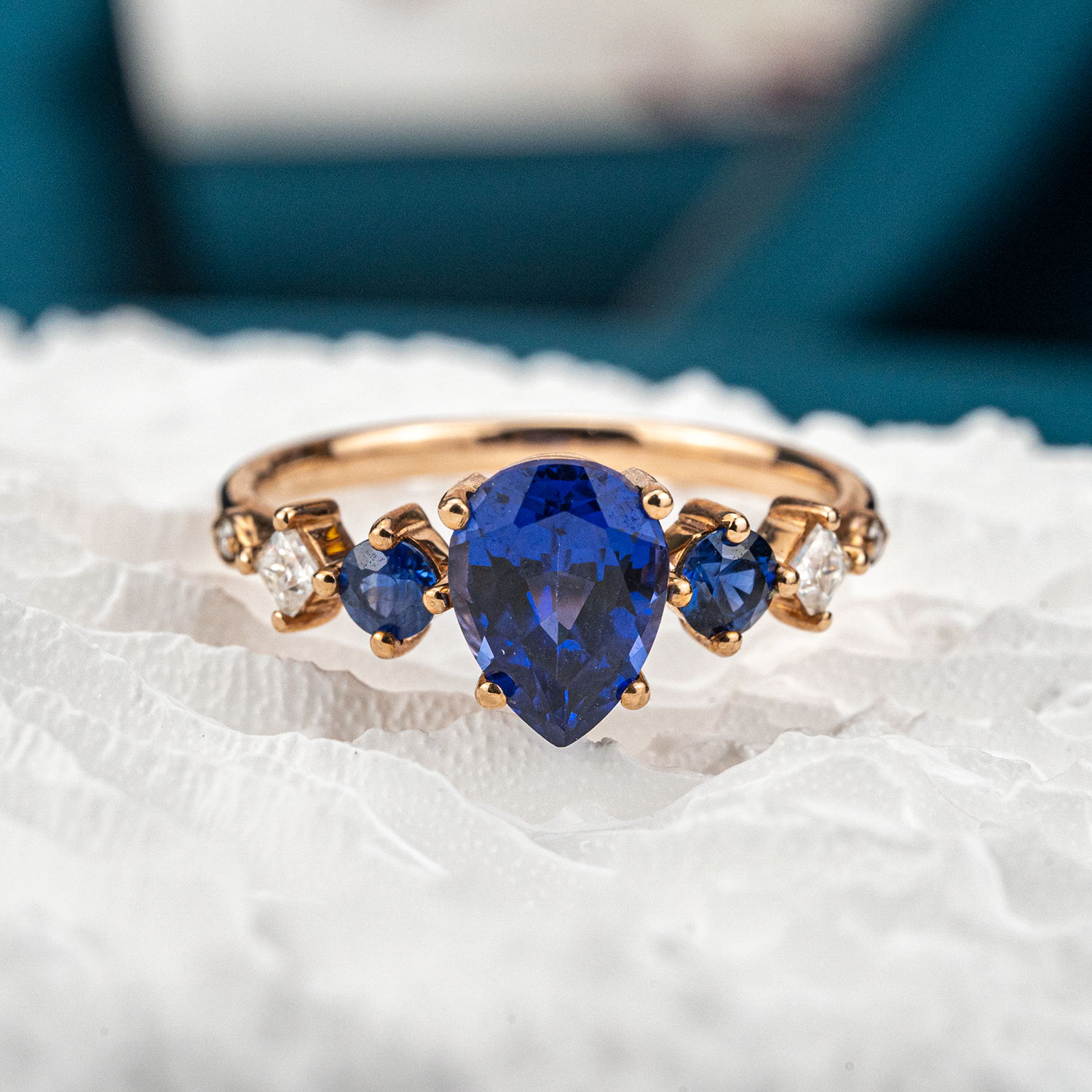 Gorgeous Sapphire engagement ring with stunning pear centerpiece