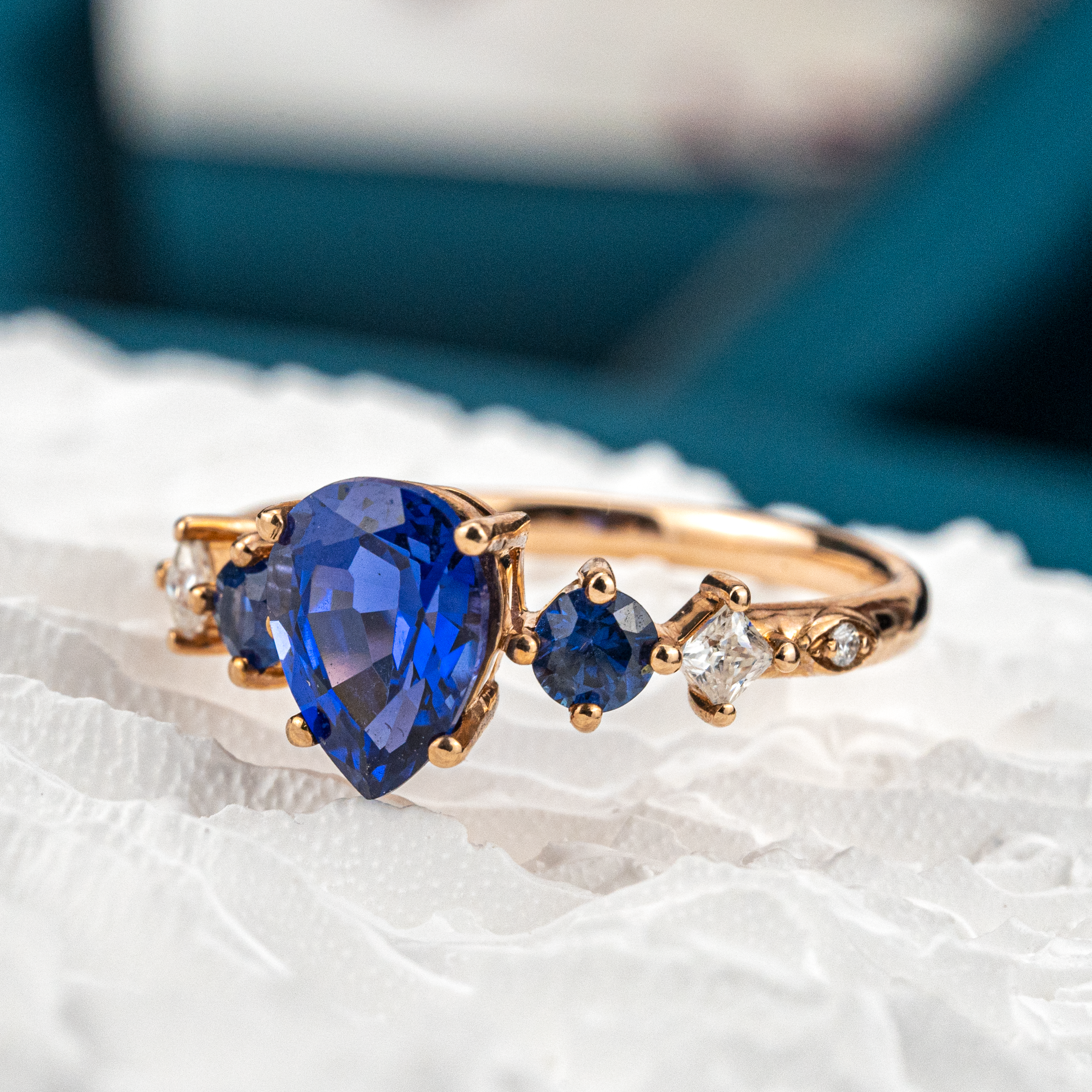 Gorgeous Sapphire engagement ring with stunning pear centerpiece