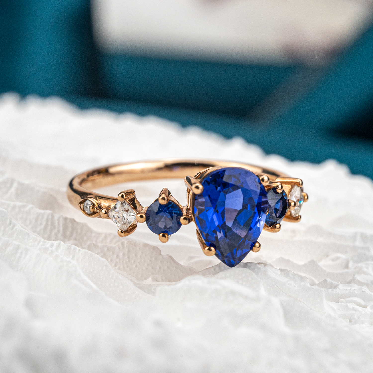 Gorgeous Sapphire engagement ring with stunning pear centerpiece