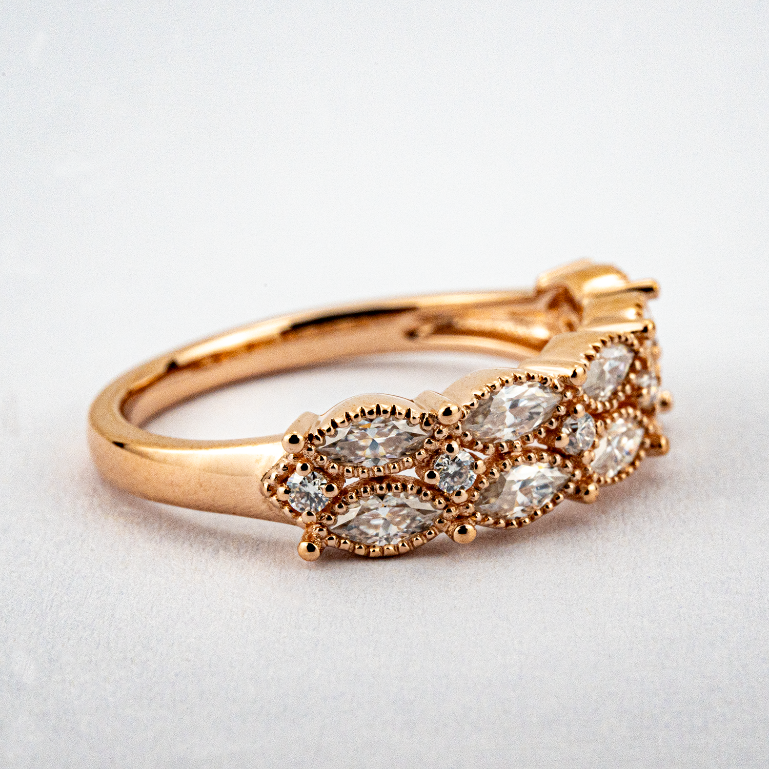 Minimalism-inspired marquise moissanite ring with elegant rose gold band for engagement