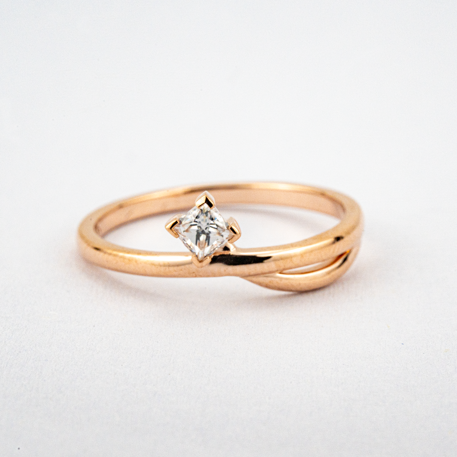 Beautiful minimalist engagement ring with diamond accent - perfect for a promise