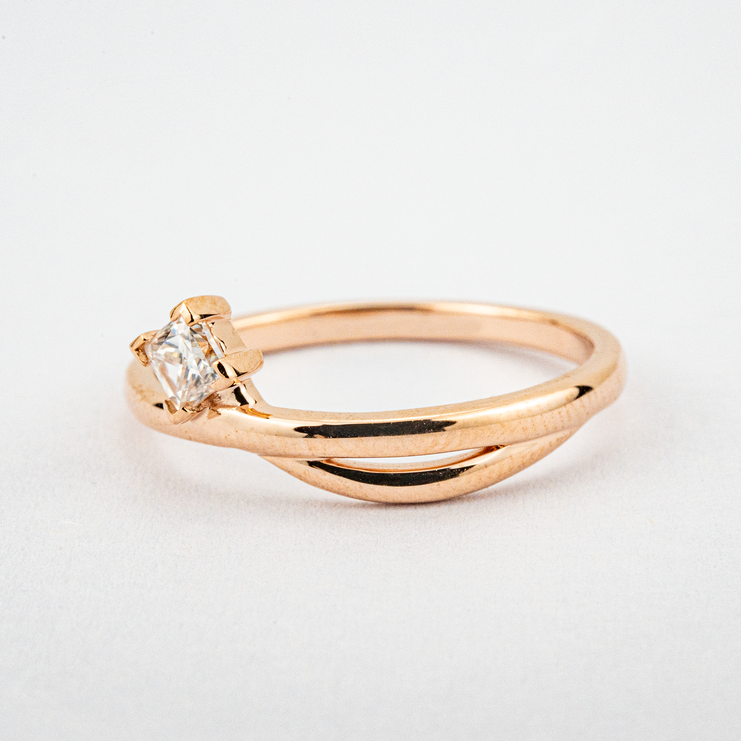 Beautiful minimalist engagement ring with diamond accent - perfect for a promise