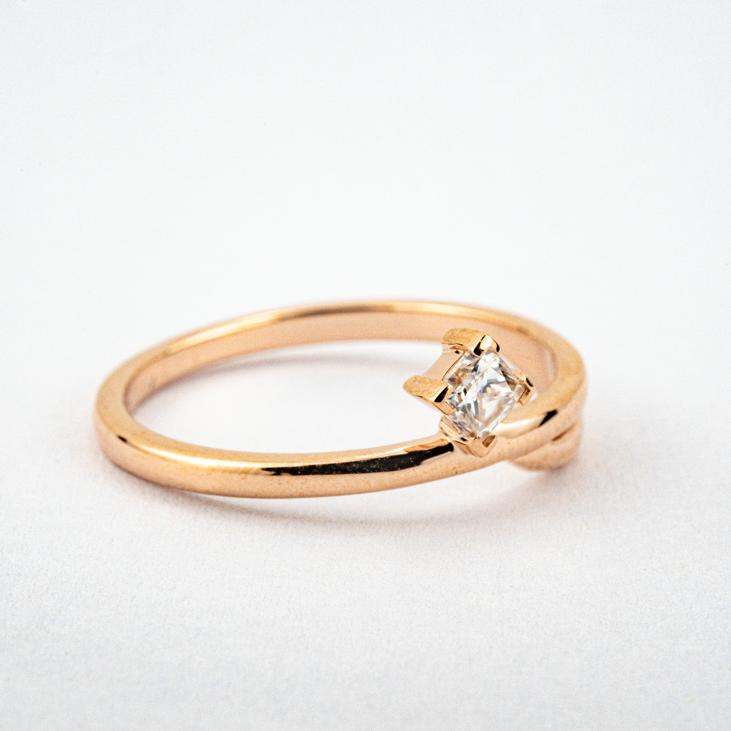 Beautiful minimalist engagement ring with diamond accent - perfect for a promise