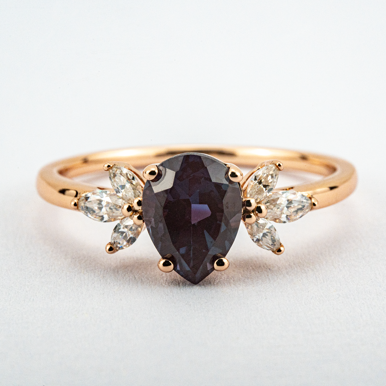Elegant pear cut Alexandrite ring, the ultimate symbol of love and commitment.