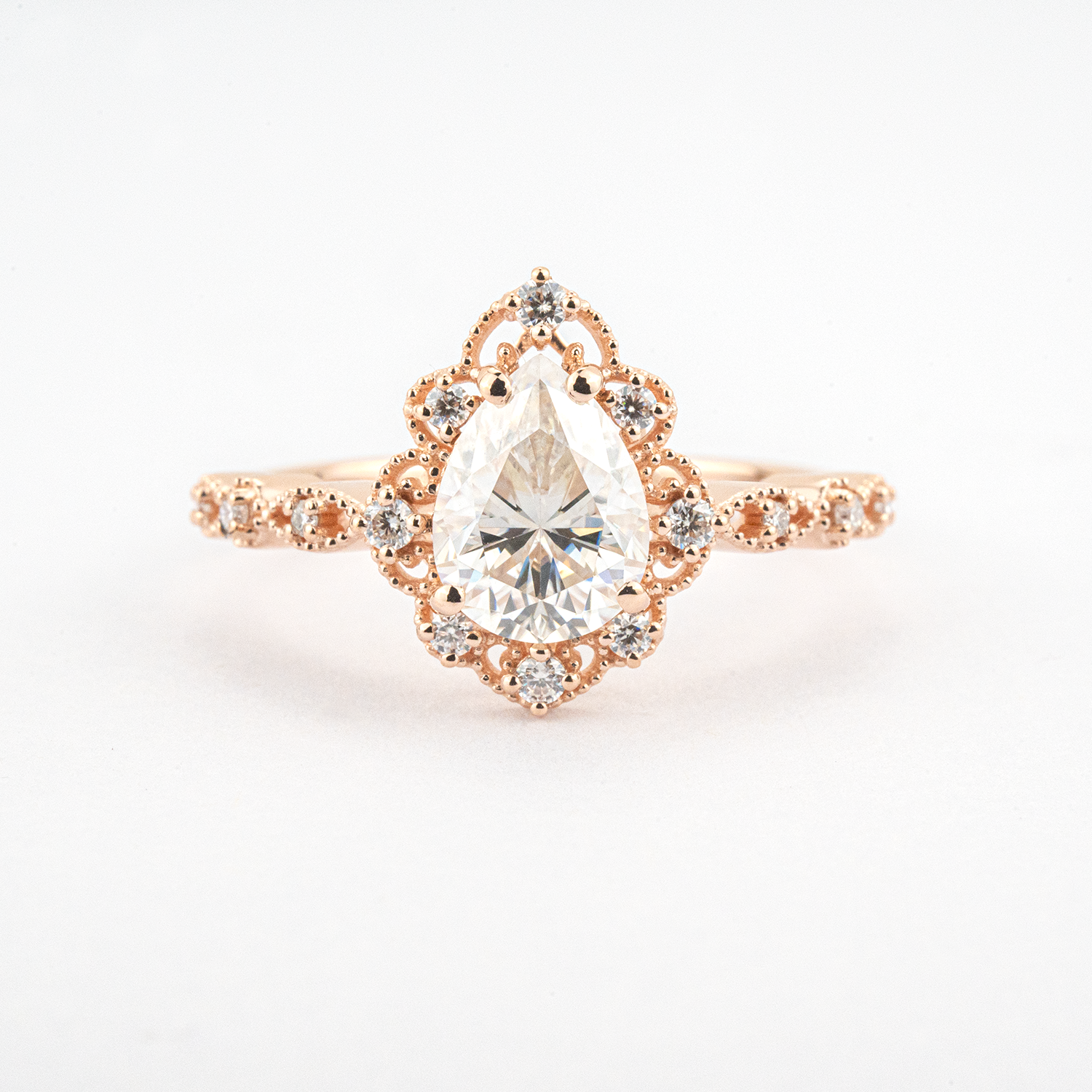 Luxurious Pear Shape Moissanite Rose Gold Three-Piece Set Unique Design Engagement Rings
