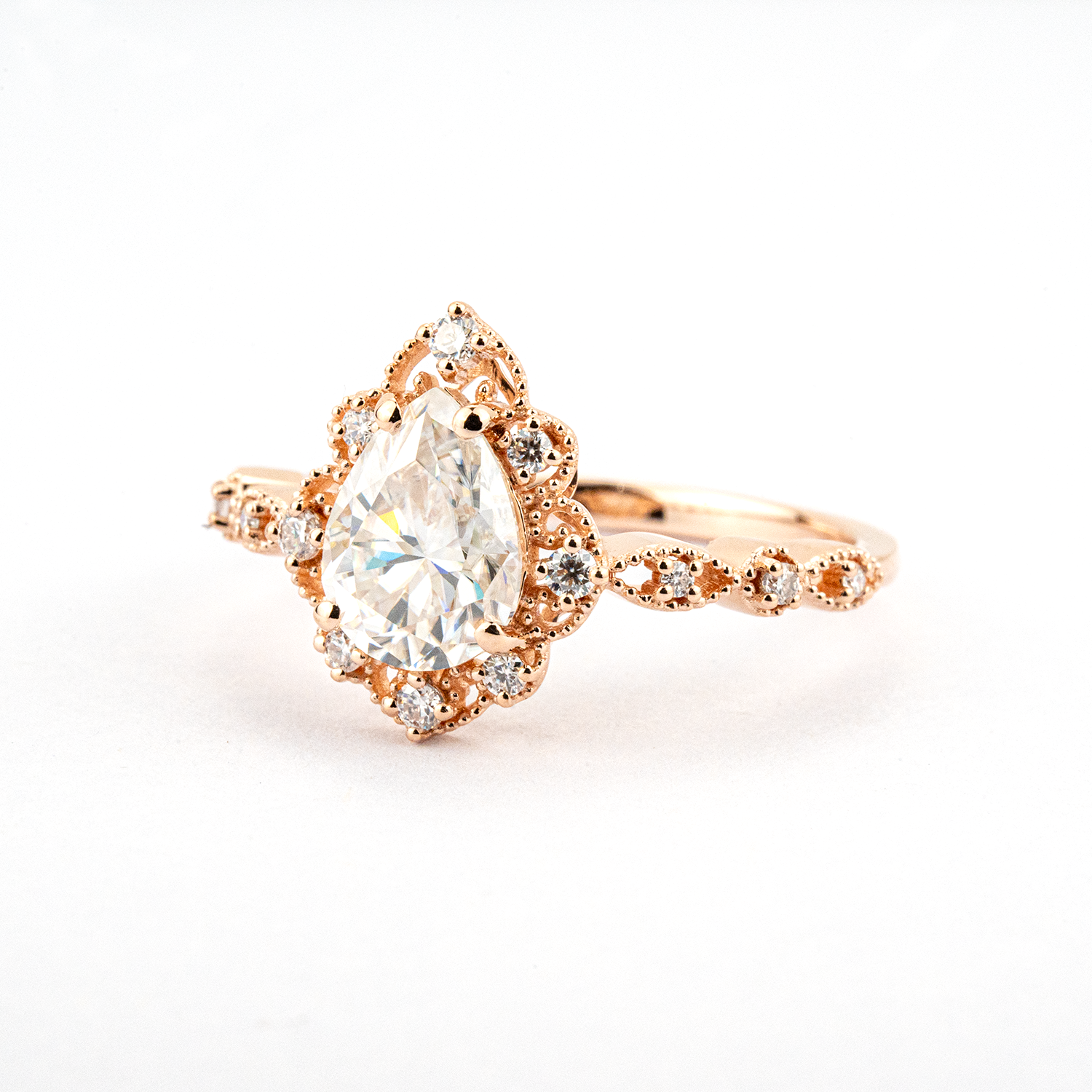 Luxurious Pear Shape Moissanite Rose Gold Three-Piece Set Unique Design Engagement Rings