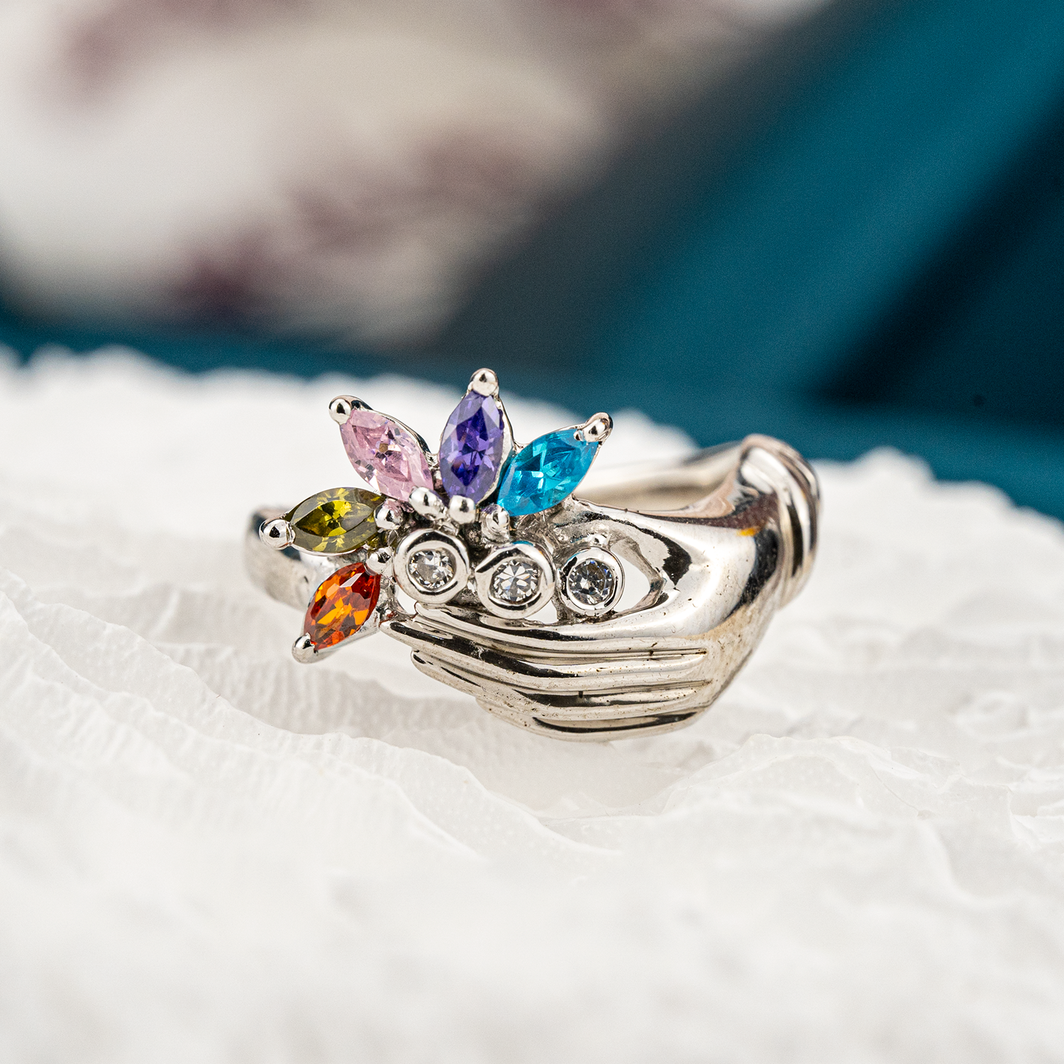 Unique white gold band featuring colorful gems for a striking accessory