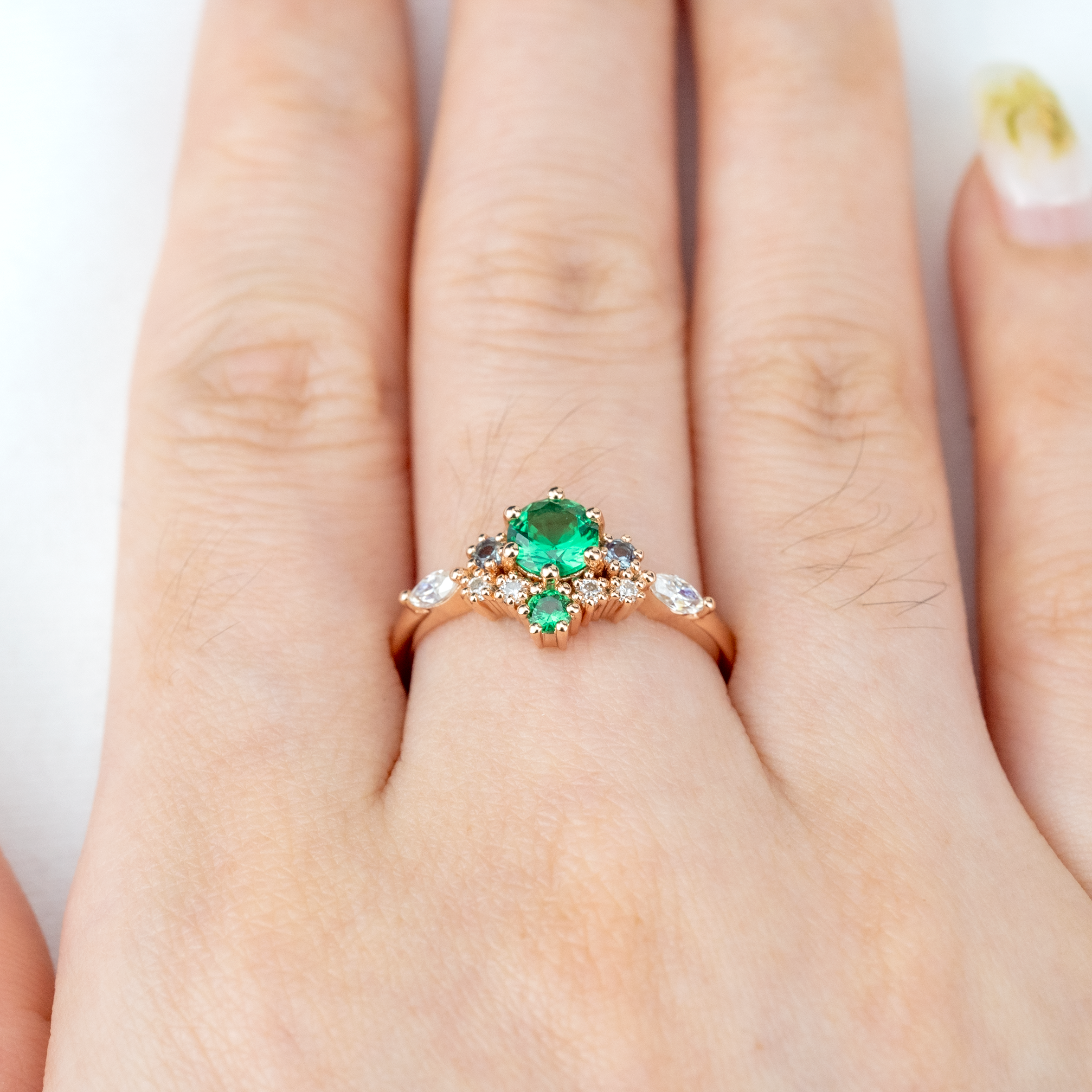 Stunning round emerald ring, perfect choice for engagements, timeless vintage design.