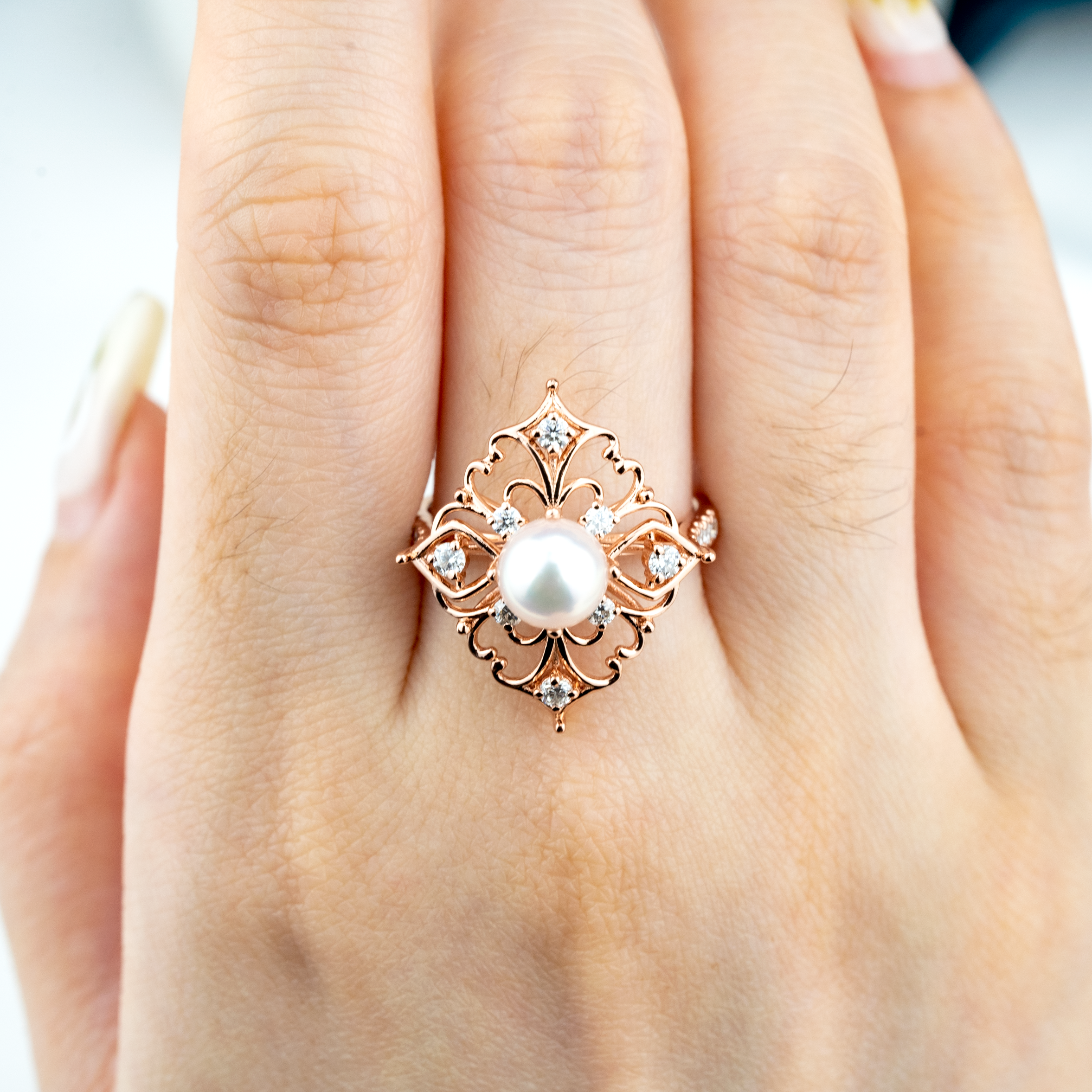 Elegant pearl and moissanite engagement ring for a luxurious occasion