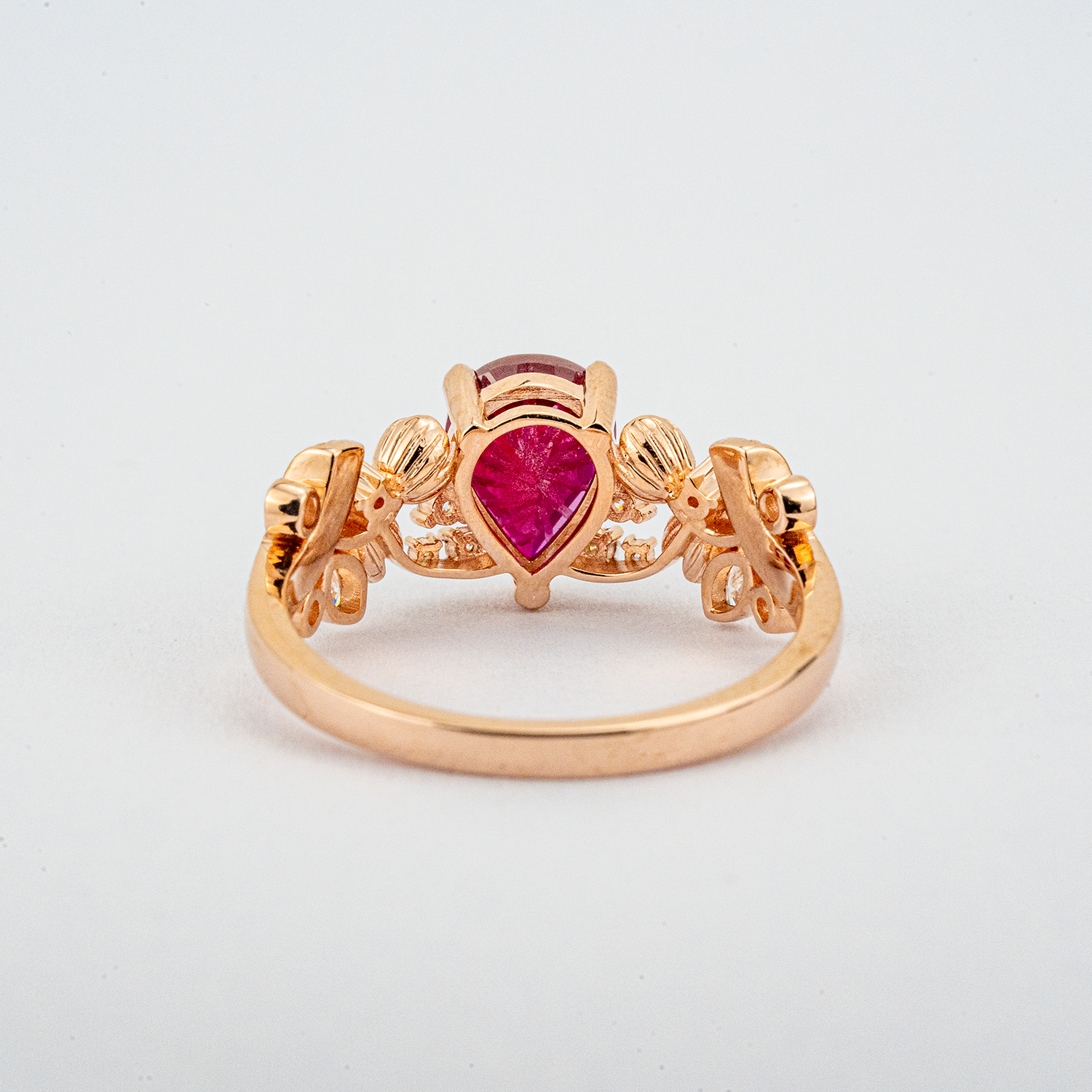 LUMINA - Pear-Shaped Garnet Leaf Rose Gold Ring with Nature-Inspired Design
