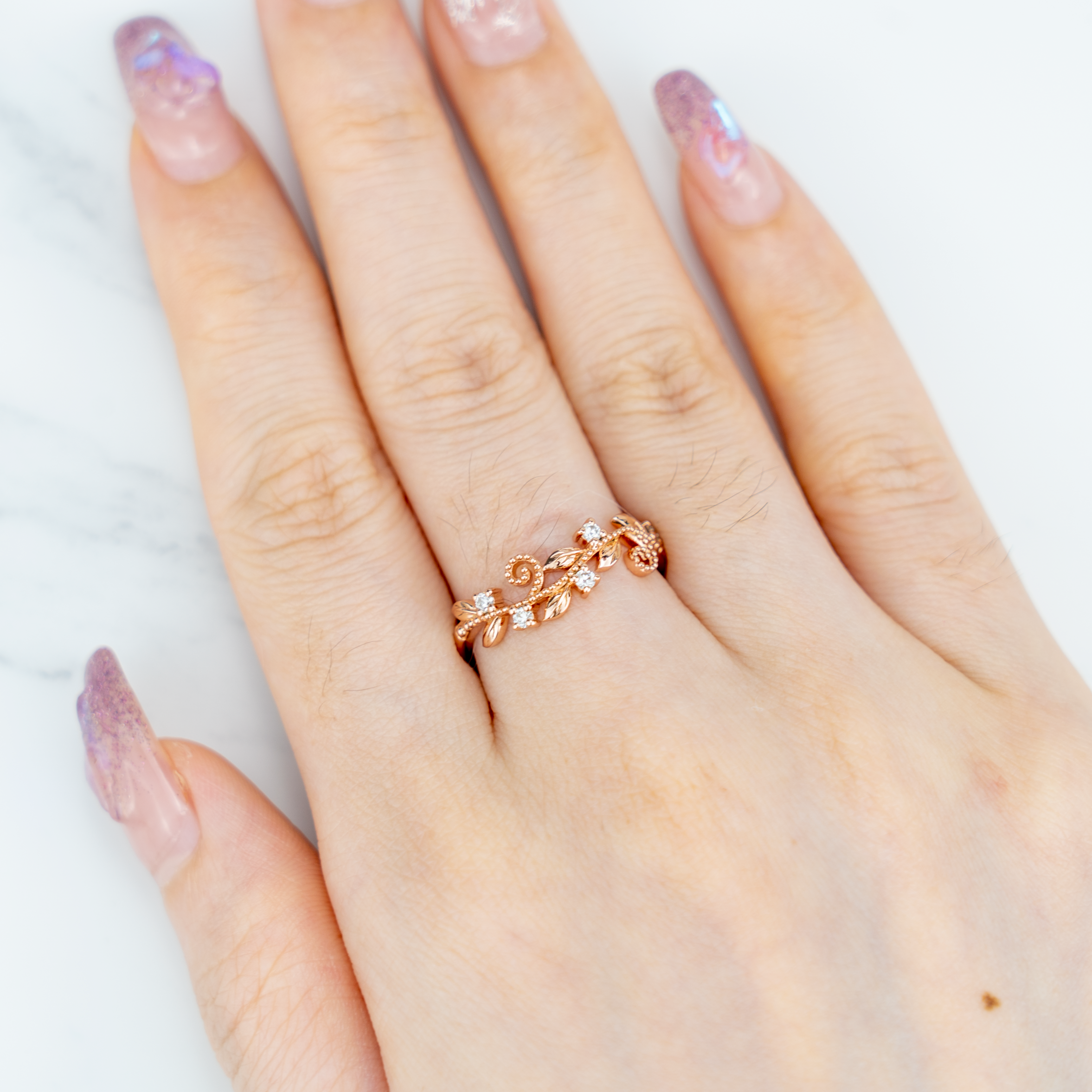 Elegant rose gold Art Deco ring, handcrafted with intricate details and a touch of luxury