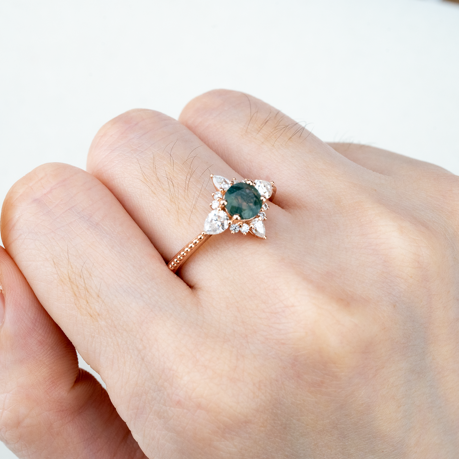 Handcrafted ring design with stunning moss agate and moissanite