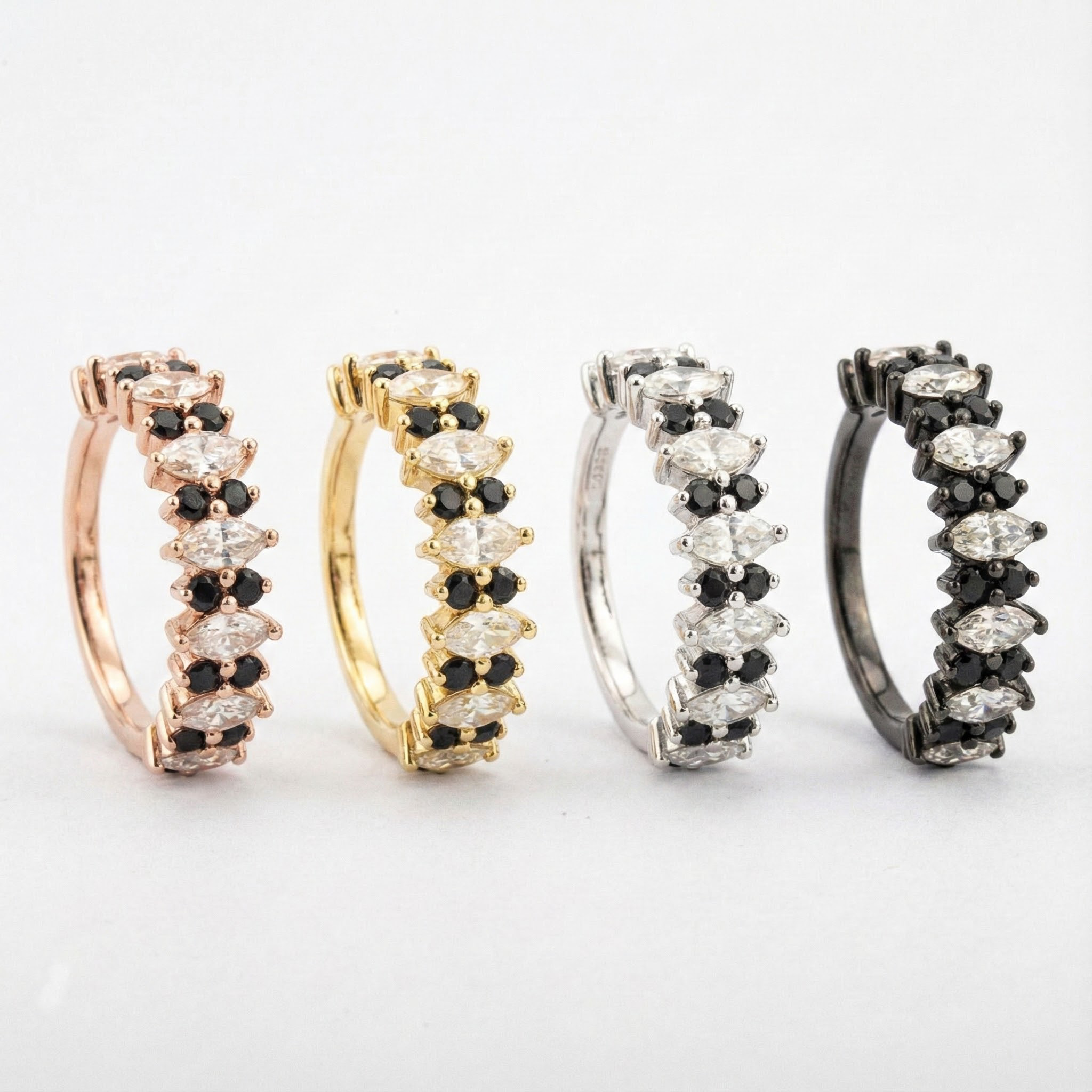 Luxurious marquise black onyx band featuring shimmering moissanite gemstone.