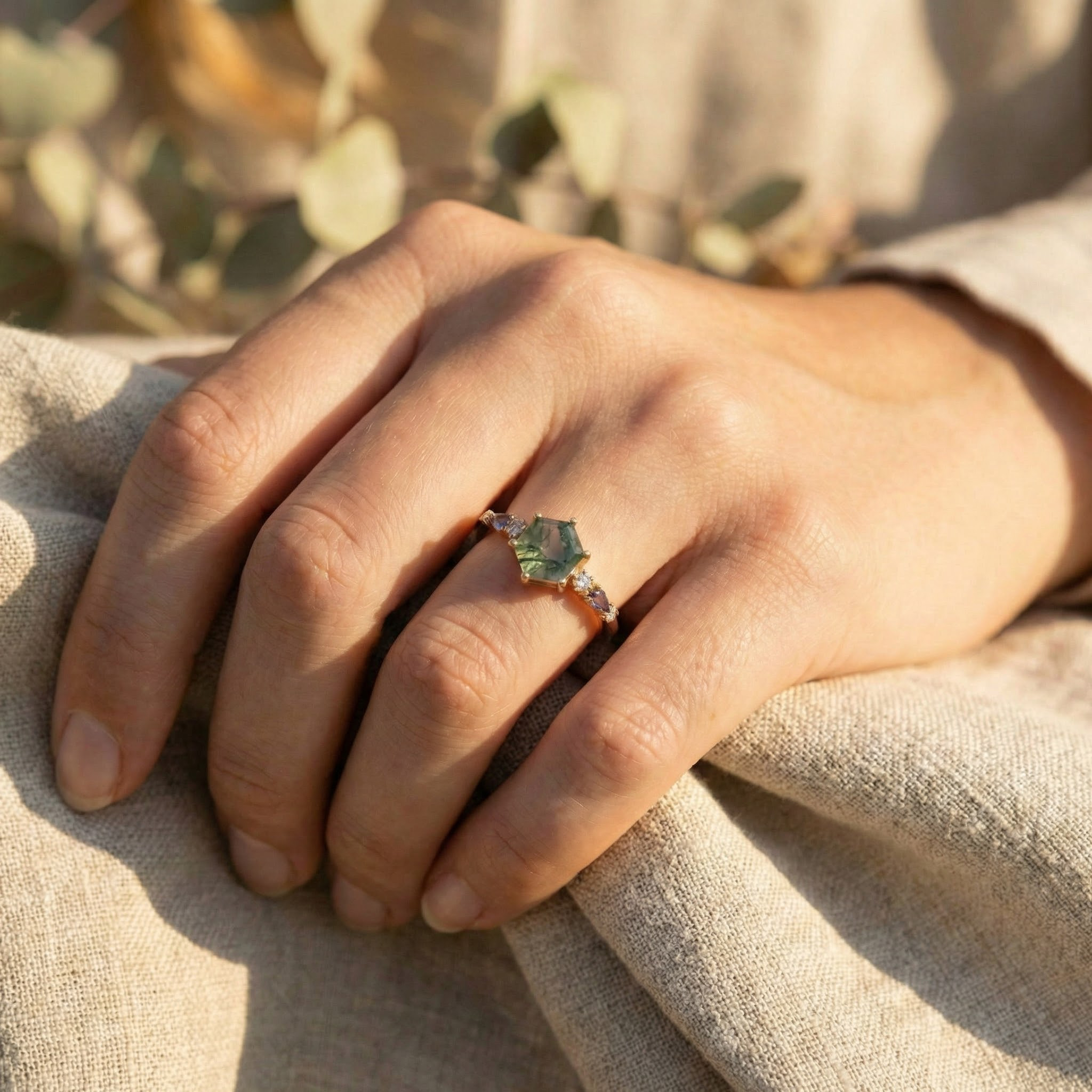 Angled view of Hexagon Moss Agate Engagement Ring in Gold