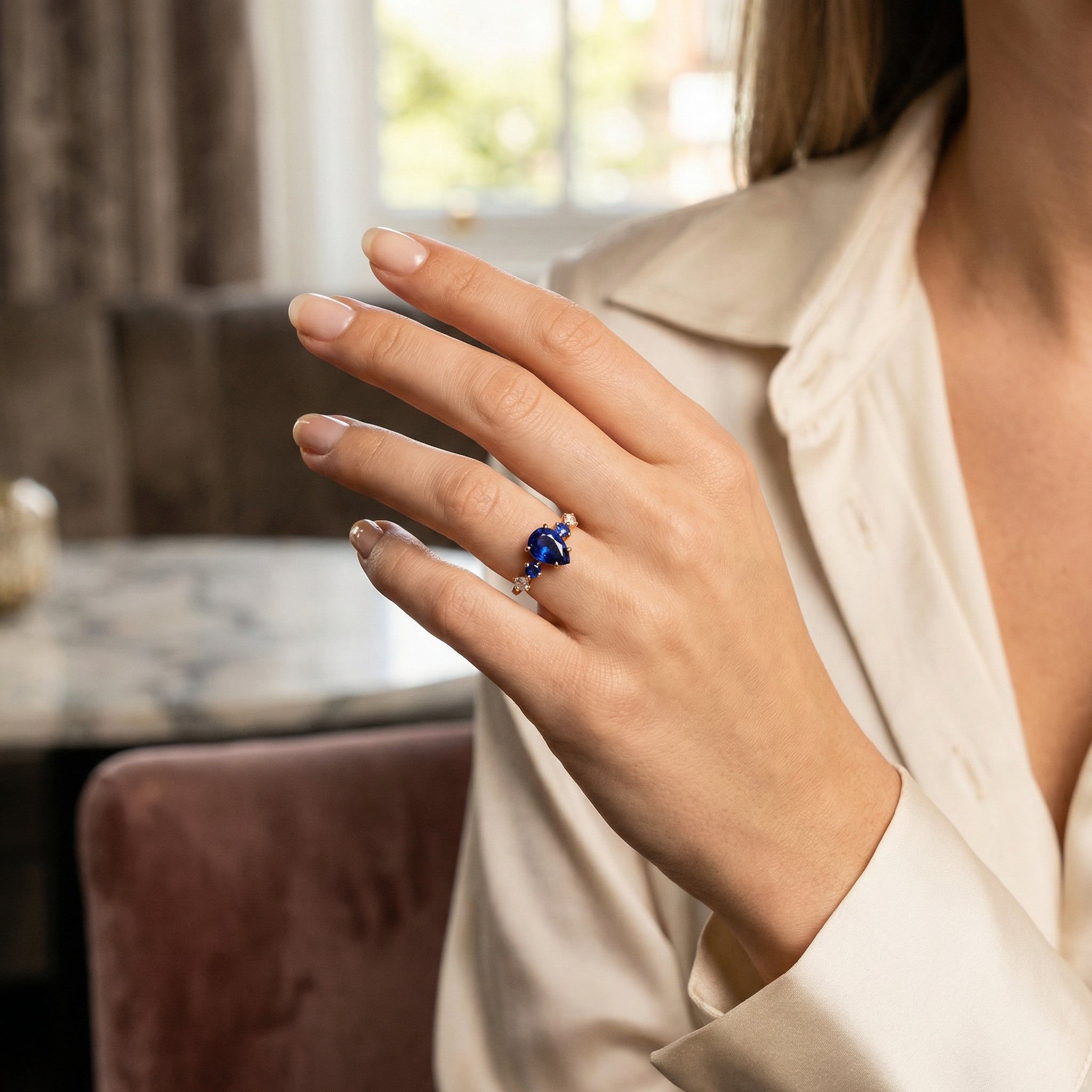 Detailed view of Pear Lab Sapphire Engagement Ring in Gold