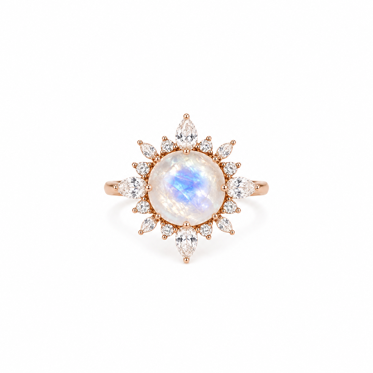 Round moonstone ring with pear moissanite halo in rose gold