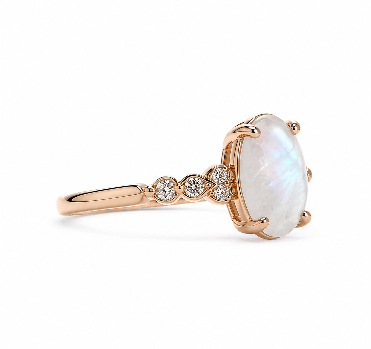 Romantic oval moonstone ring with delicate accent stones