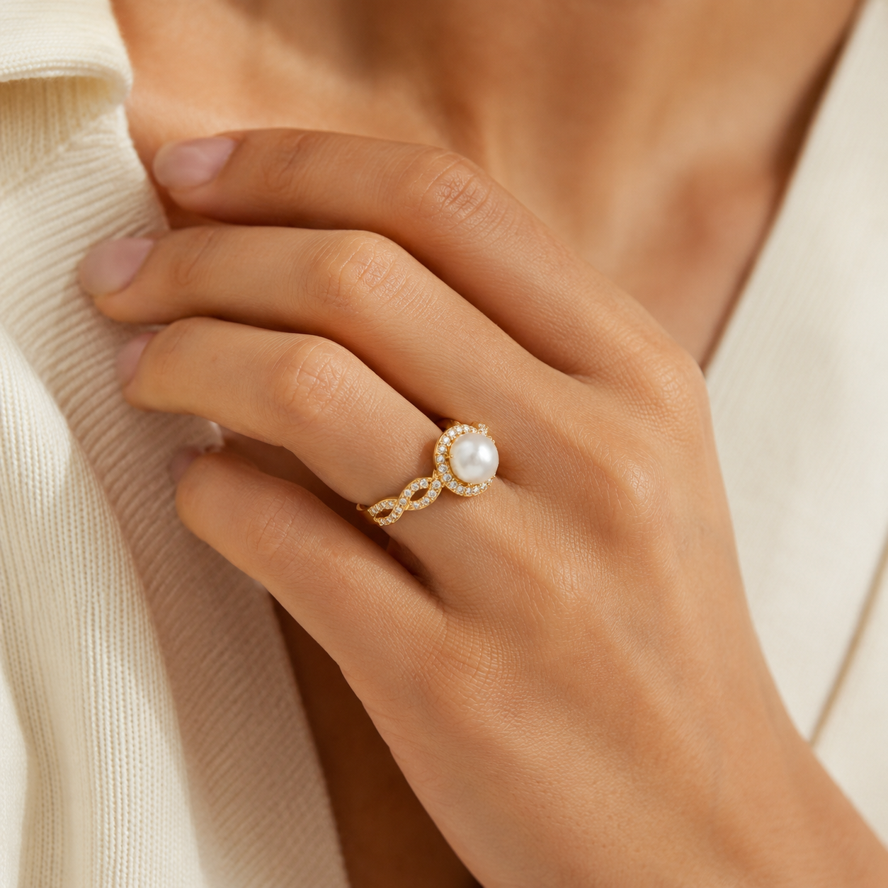Hand model wearing Pearl Wedding Band in Rose Gold