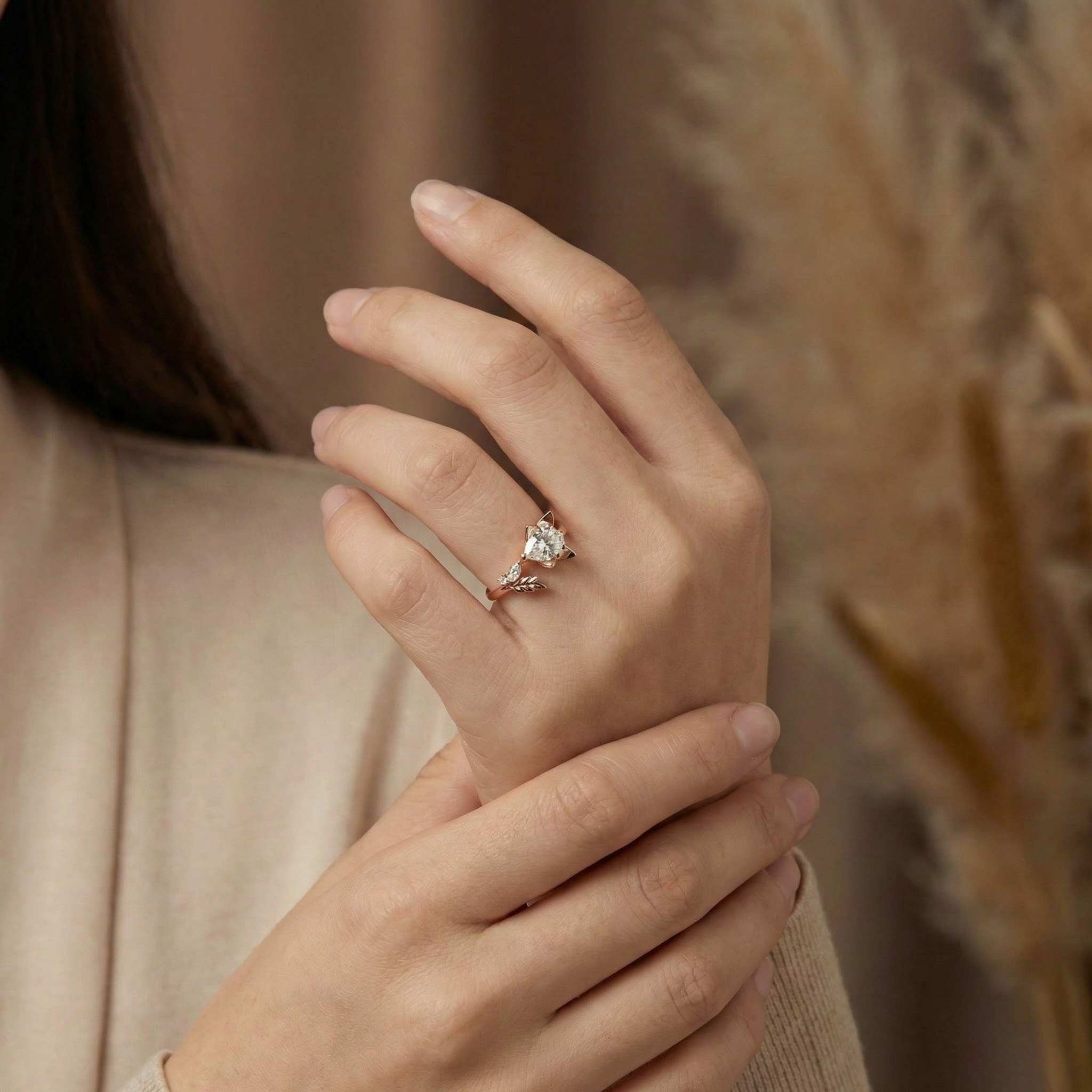 Angled view of Pear Moissanite Engagement Ring in Gold