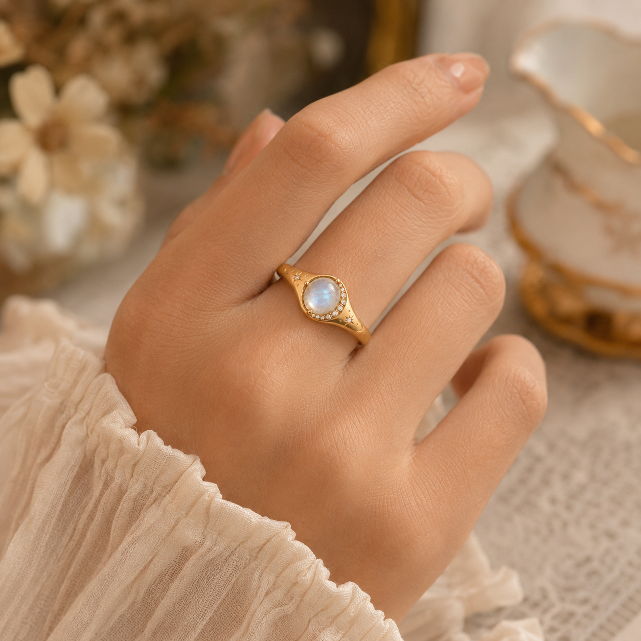 Celestial gold moonstone ring with 6mm round moonstone, moissanite crescent halo, and engraved star moon band