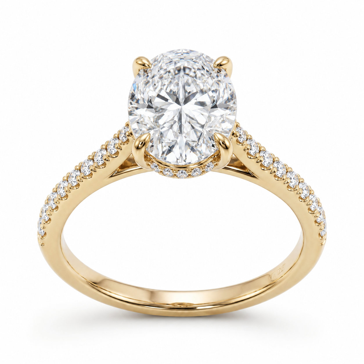 Oval lab-grown diamond hidden halo engagement ring in yellow gold with pavé diamond band