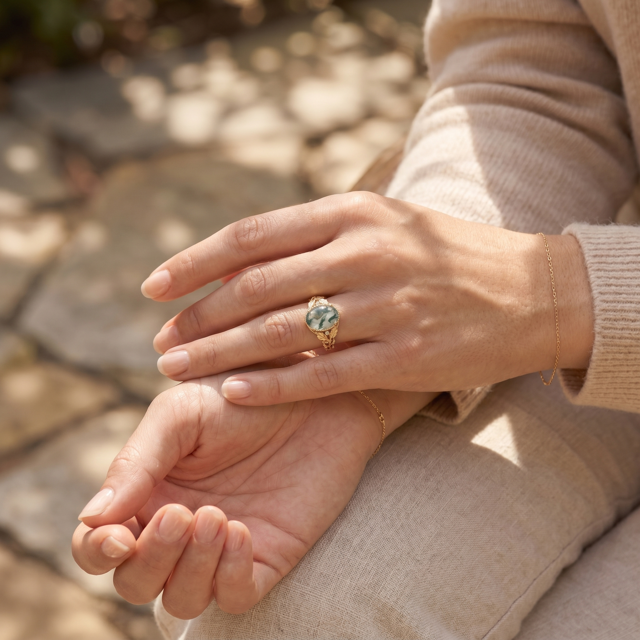 Lifestyle view of Oval Moss Agate Engagement Ring in Gold