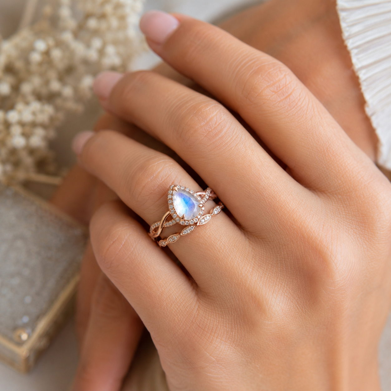 pear-moonstone-bridal-set-twisted-moissanite-band