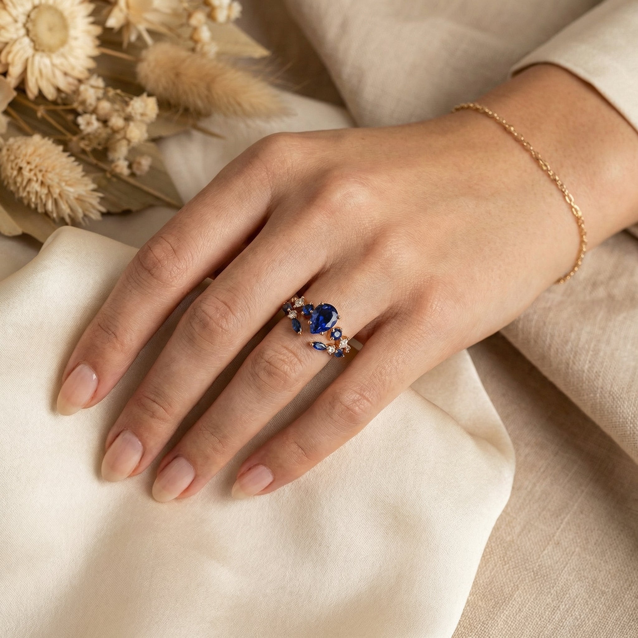 Detailed view of Pear Lab Sapphire Ring Set in Gold