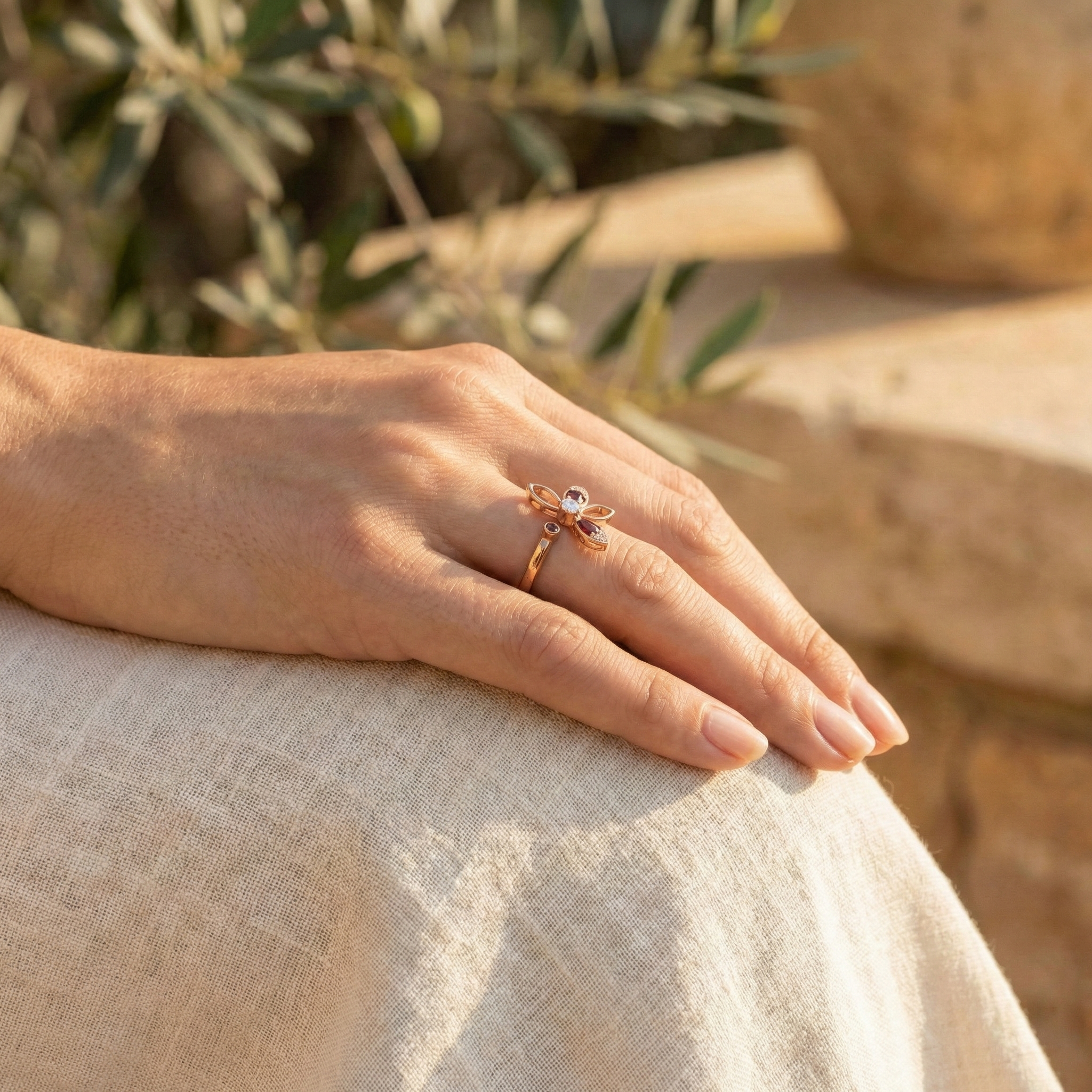 Detailed view of Garnet Ring in Gold