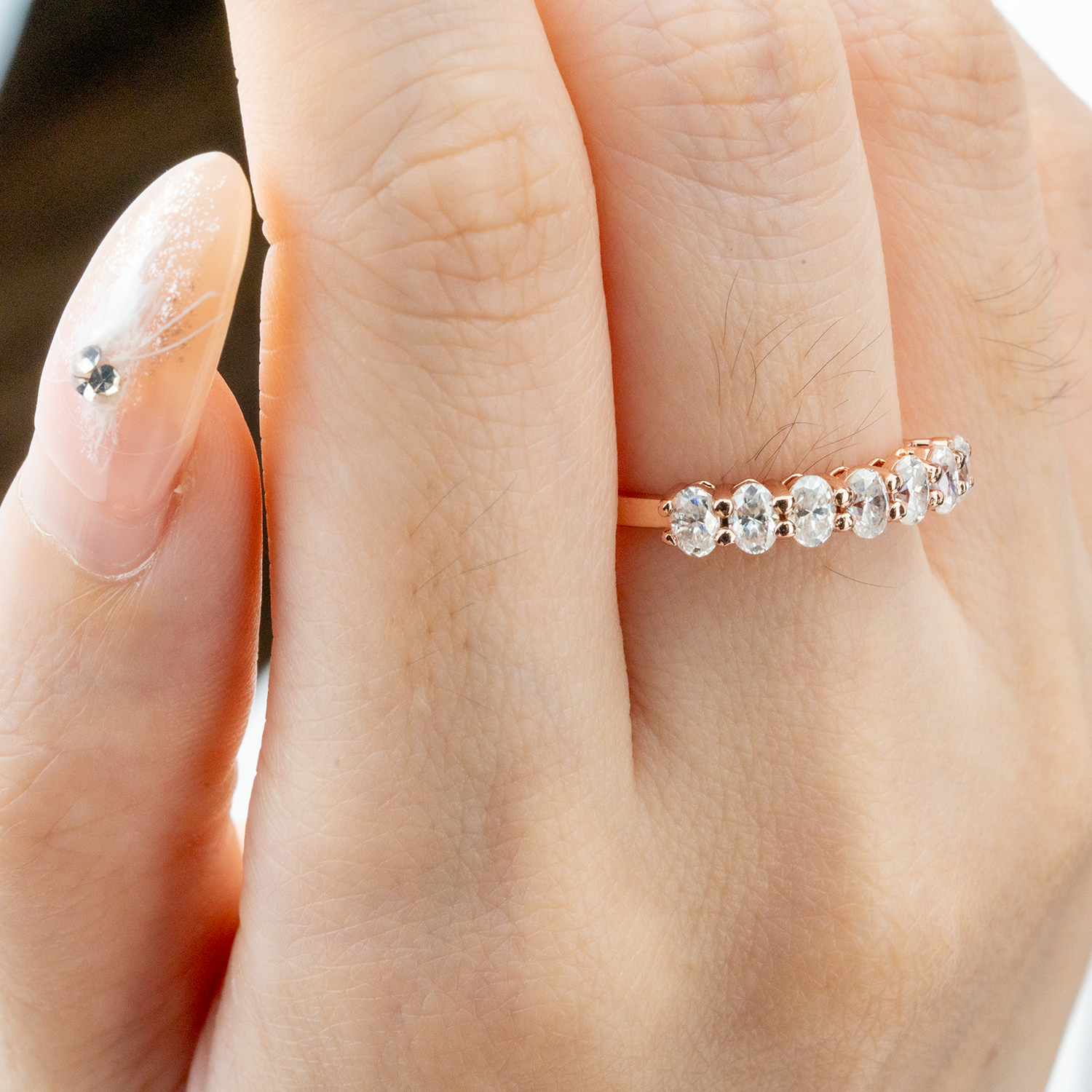 Oval Moissanite Band Wedding Ring - Unique design for sophisticated brides.