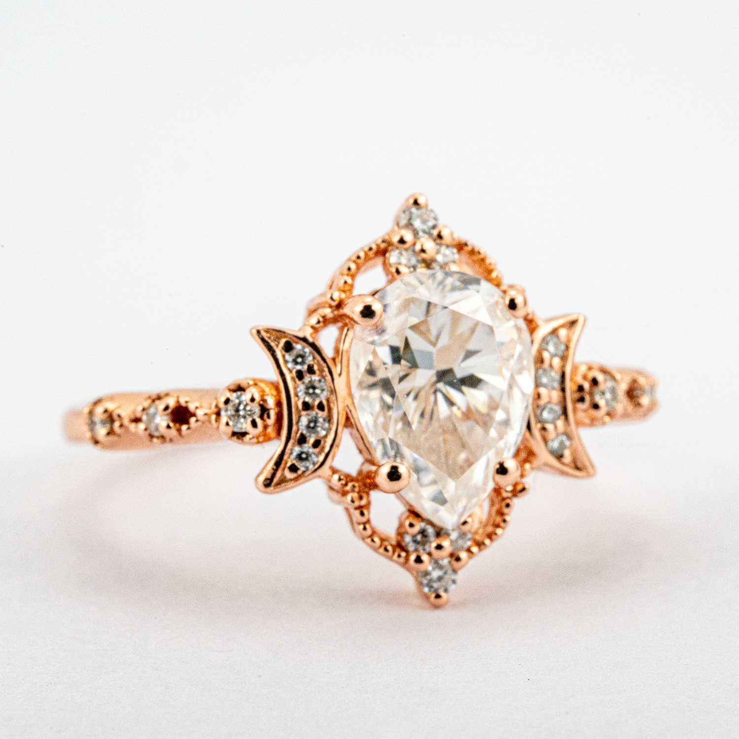 Pear Moissanite Crescent Moon Engagement Ring.
