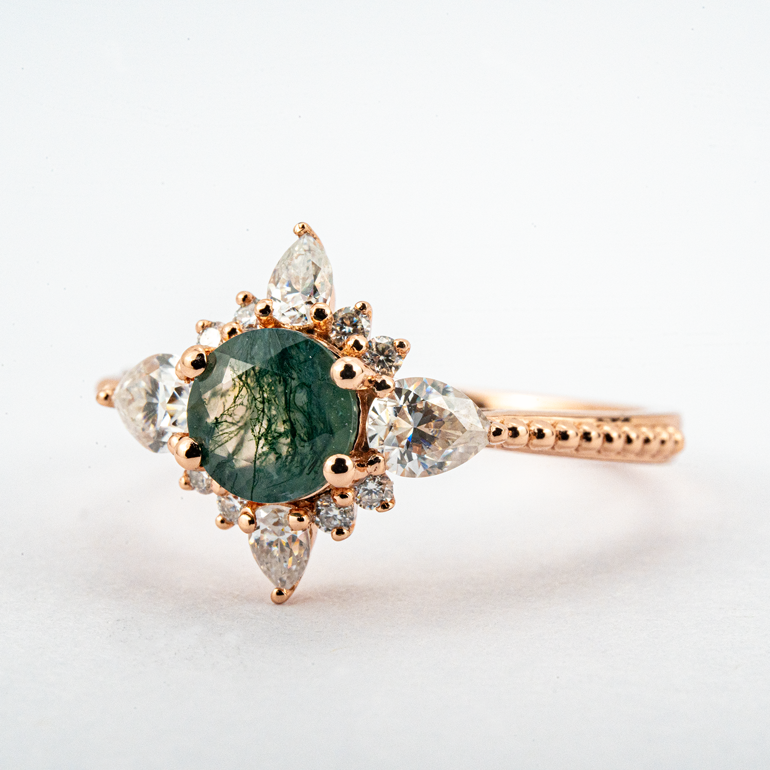 Handcrafted ring design with stunning moss agate and moissanite