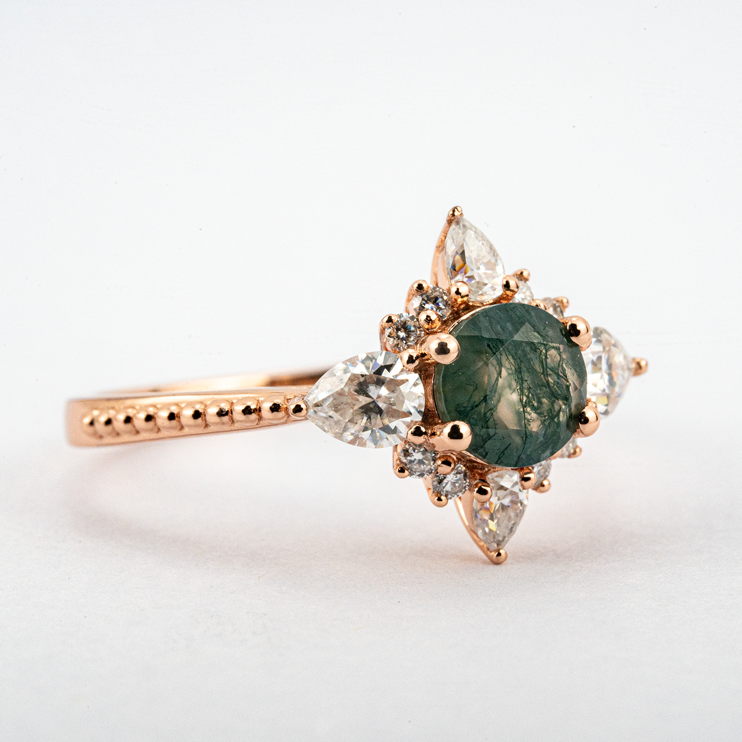 Handcrafted ring design with stunning moss agate and moissanite