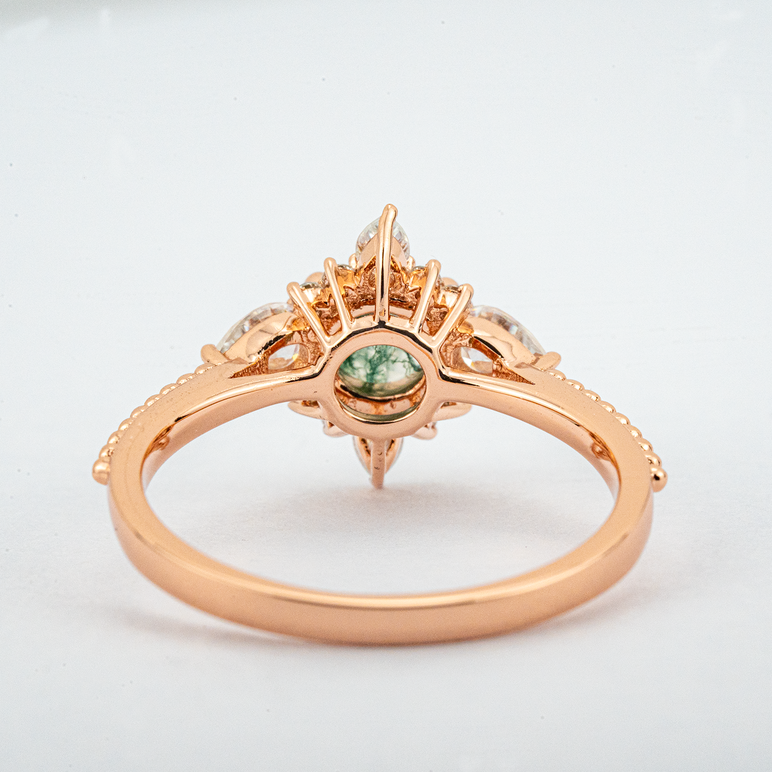 Handcrafted ring design with stunning moss agate and moissanite