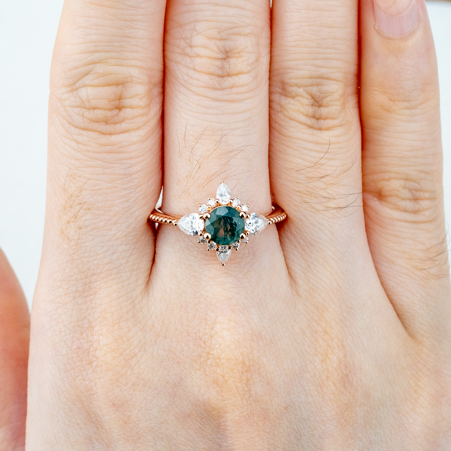 Handcrafted ring design with stunning moss agate and moissanite