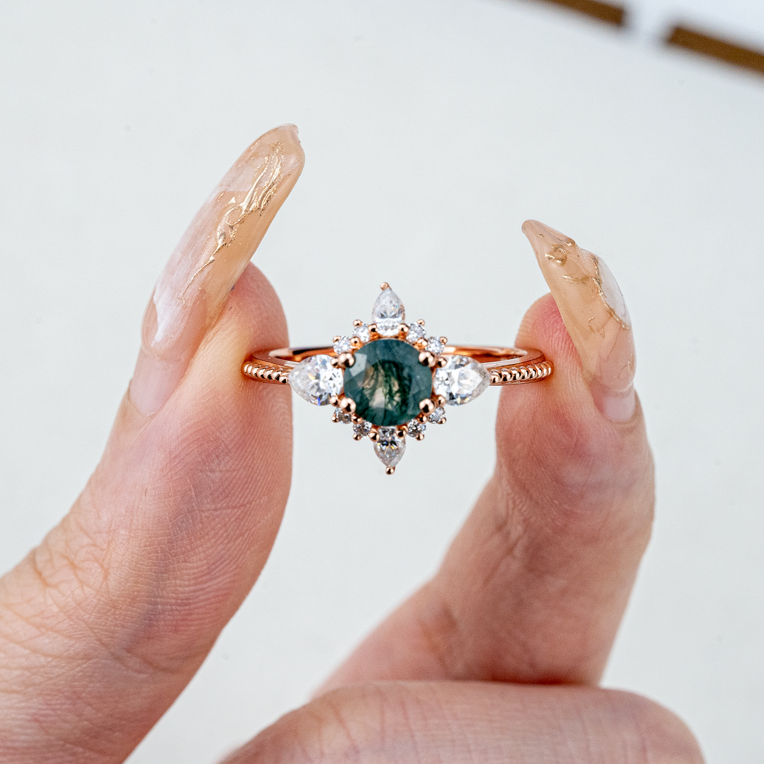 Handcrafted ring design with stunning moss agate and moissanite