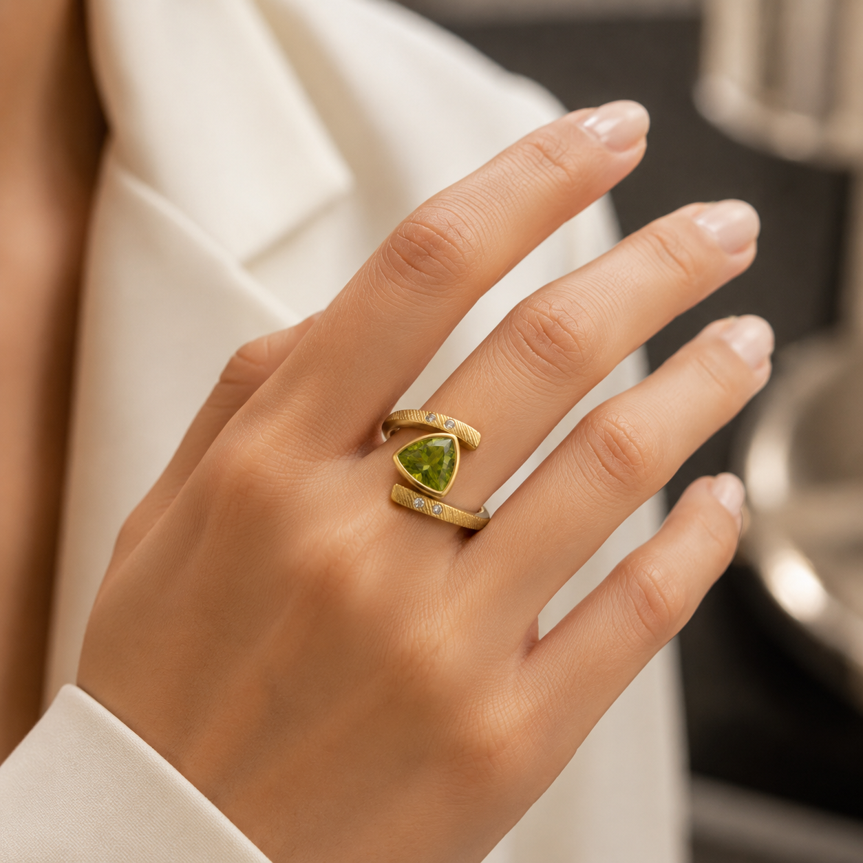 Trillion peridot engagement ring with modern gold setting