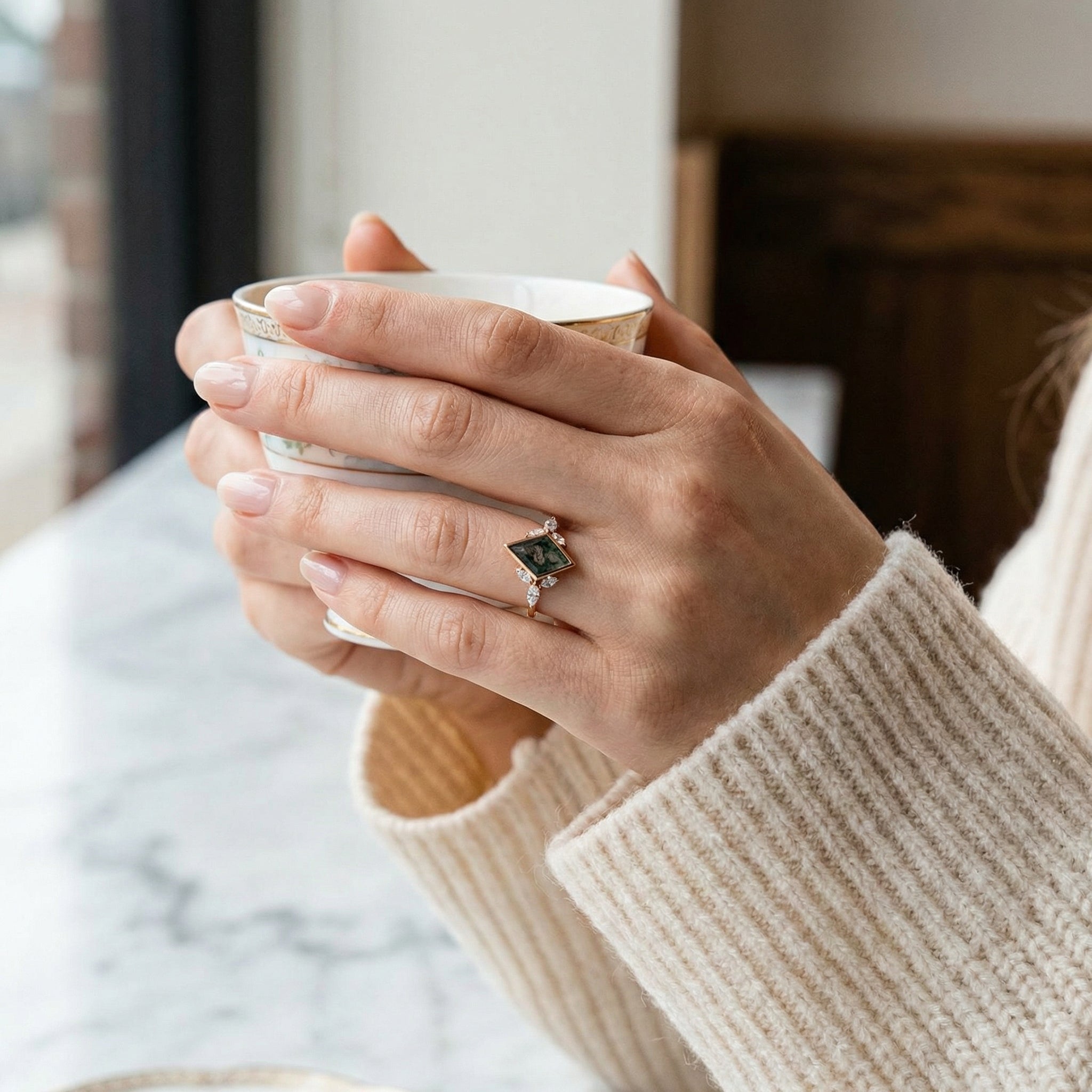 Angled view of Kite Cut Moss Agate Ring in Gold