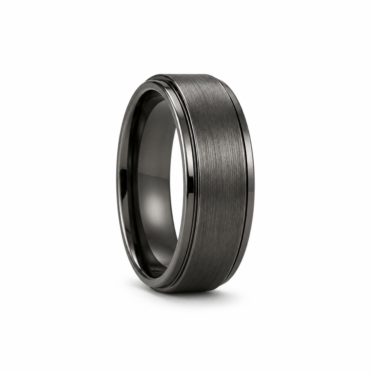 Black gold brushed men’s wedding band styled on dark marble background
