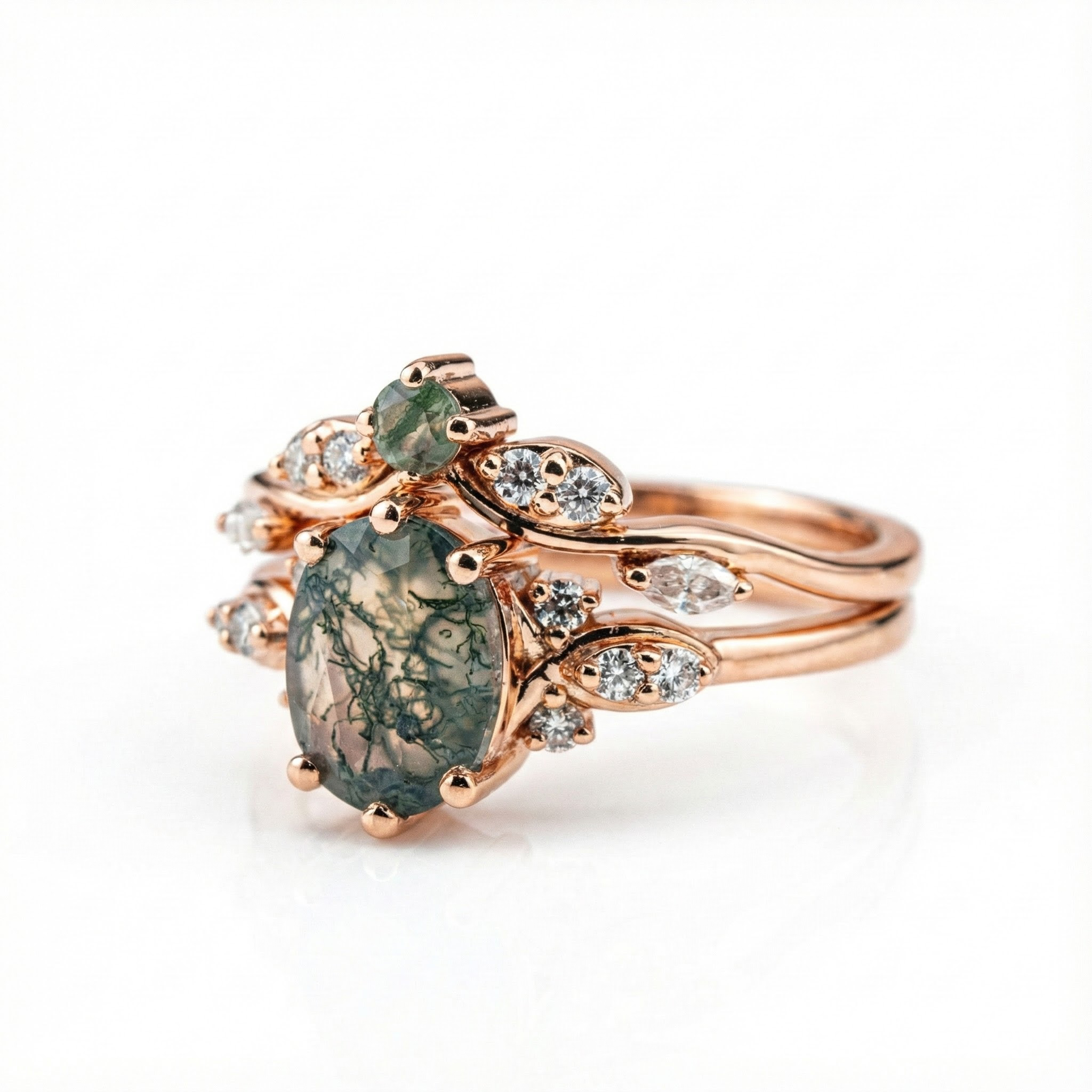 Elegant jewelry set with oval moss agate stones, moissanite gems in a nature-inspired design